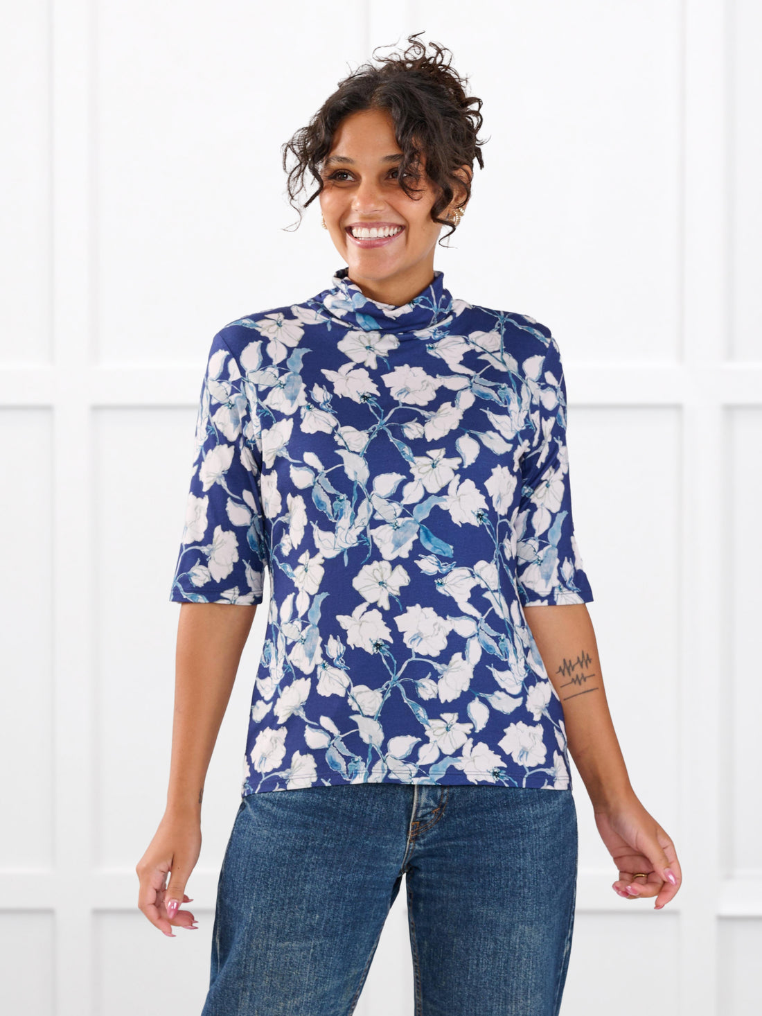 Halima half sleeve turtleneck top for women in Indigo bloom on model Meron, size XS @Meron-XS 