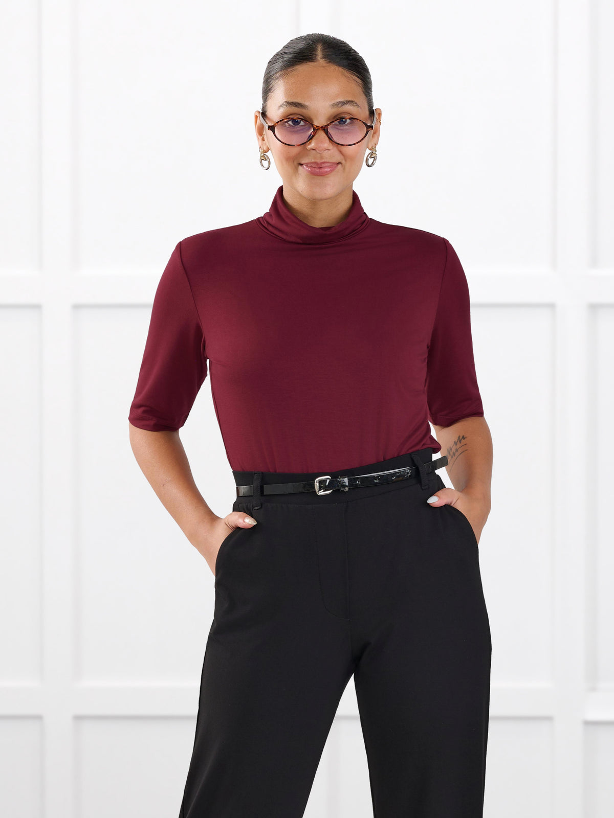 Halima half sleeve turtleneck top for women in Merlot on model Meron, size XS @Meron-XS 