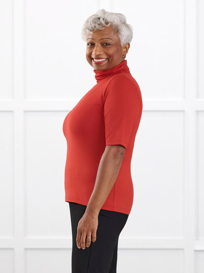 Halima half sleeve turtleneck top for women in Terracotta on model Keethai, size M @Keethai-M 