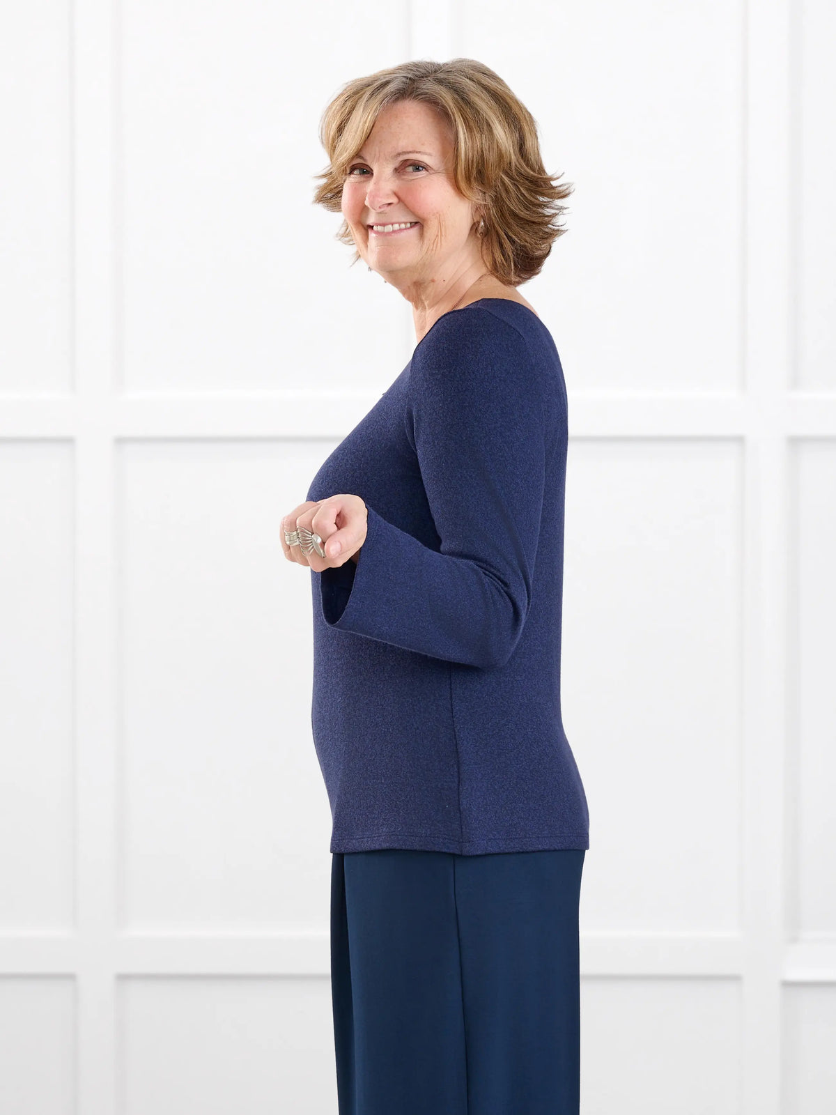 Irma lightweight sweater knit boatneck top for women in Midnight blue on model Donna, size S @Donna-S 