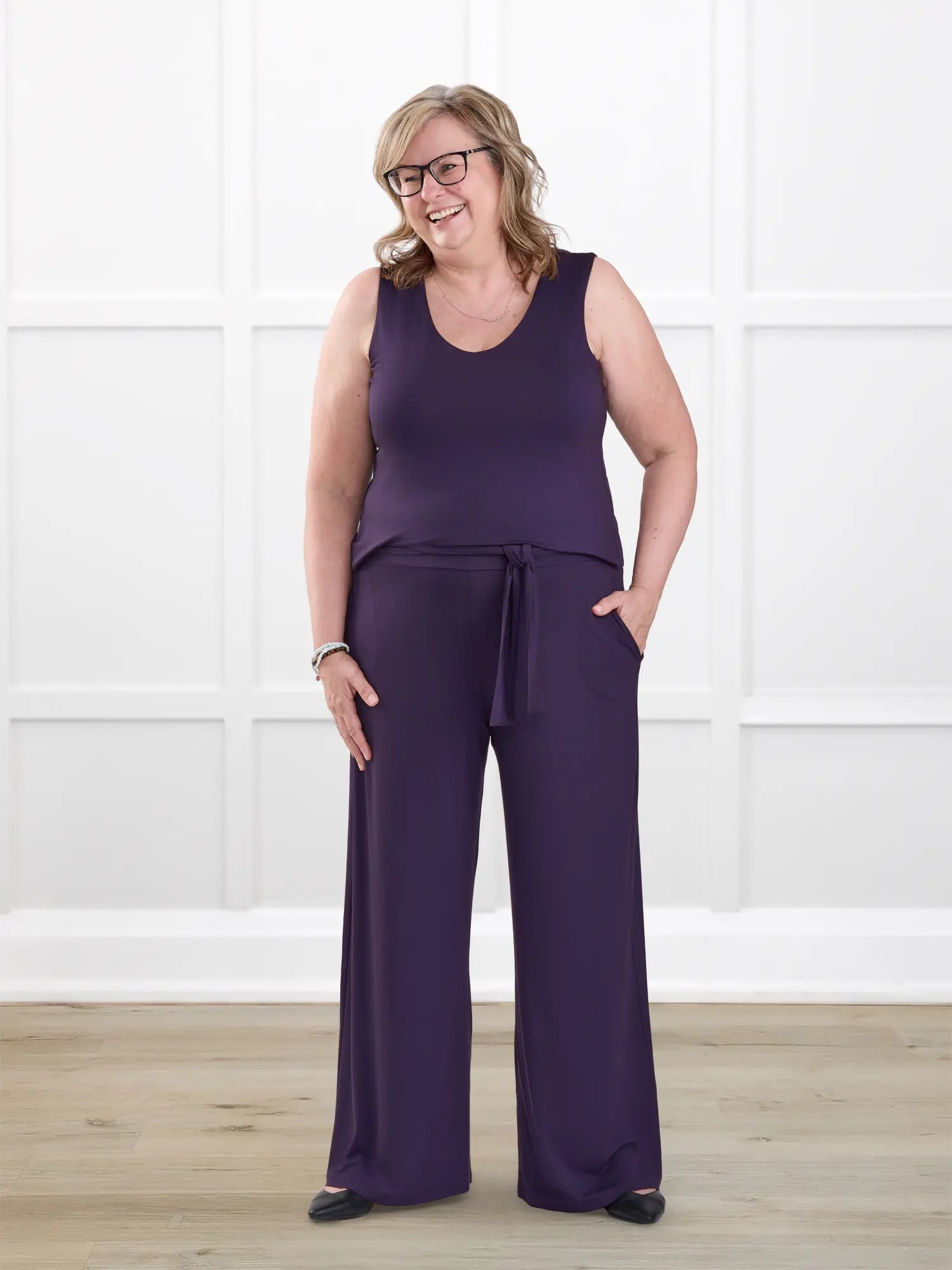 Janelle open back wide leg jumpsuit for women in Aubergine on model Deb, size XL Regular @Deb-XL-regular 