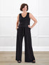 Janelle open back wide leg jumpsuit for women in Black on model Donna, size S Regular @Donna-S-regular 