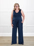 Janelle open back wide leg jumpsuit for women in Navy on model Deb, size XL Regular @Deb-XL-regular 