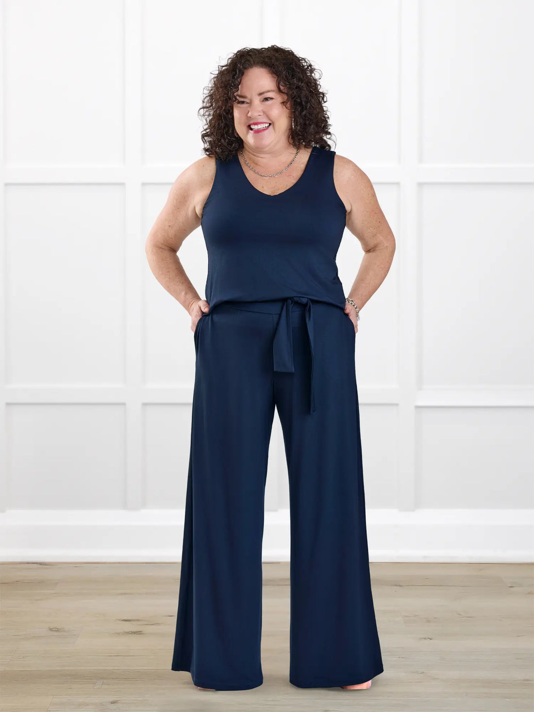 Janelle open back wide leg jumpsuit for women in Navy on model Kerri, size M Petite @Kerri-M-petite 