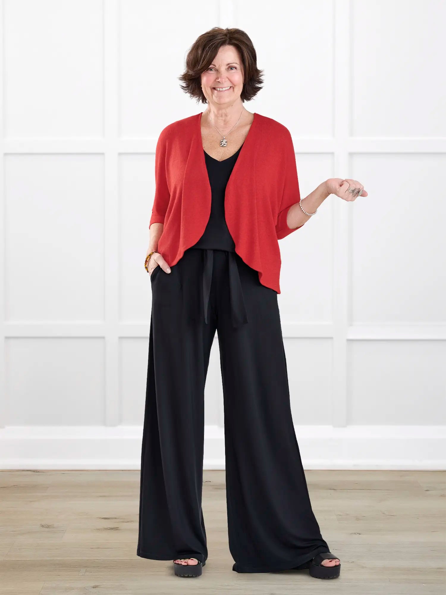 Janelle open back wide leg jumpsuit for women in Black on model Donna, size S Regular @Donna-S-regular 