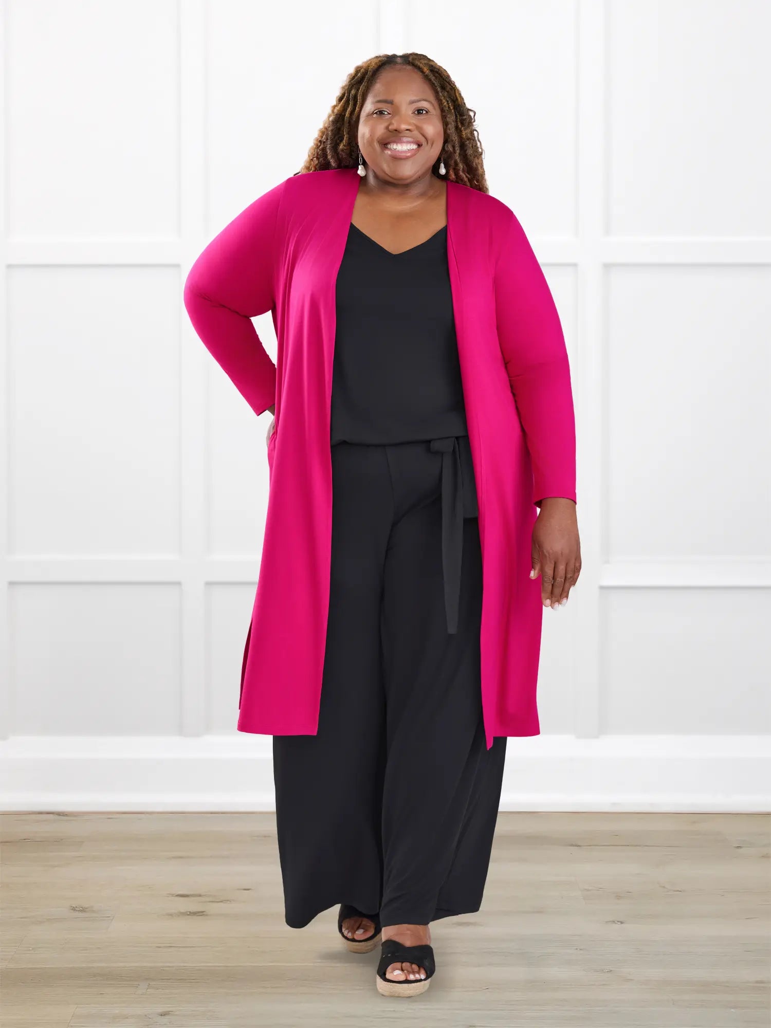 Janelle open back wide leg jumpsuit for women in Black on model Kimesha, size 3X @Kimesha-3X 