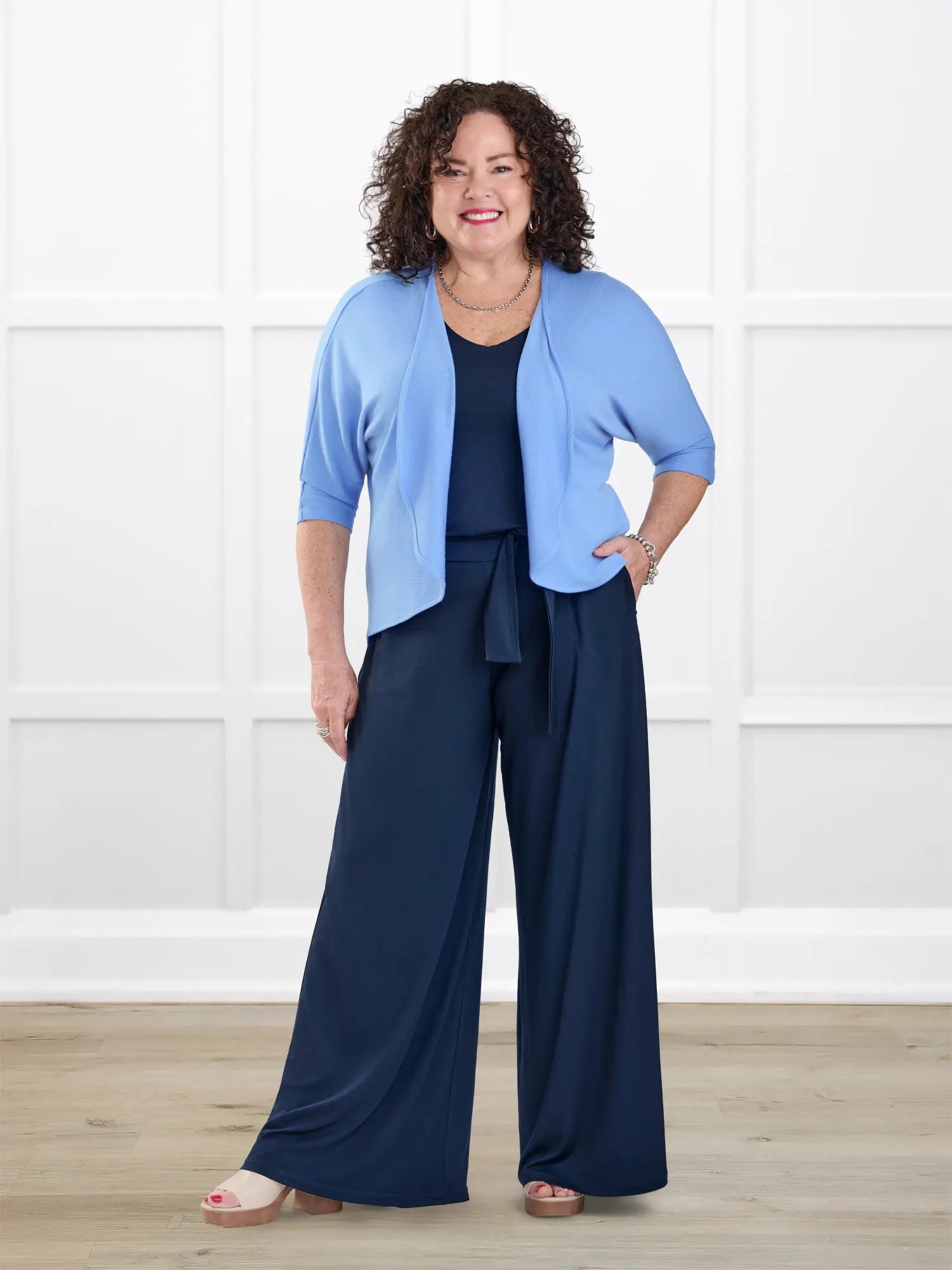 Janelle open back wide leg jumpsuit for women in Navy on model Kerri, size M Petite @Kerri-M-petite 