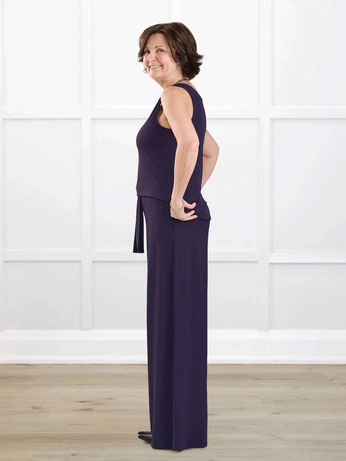 Janelle open back wide leg jumpsuit for women in Aubergine on model Donna, size S Regular @Donna-S-regular 