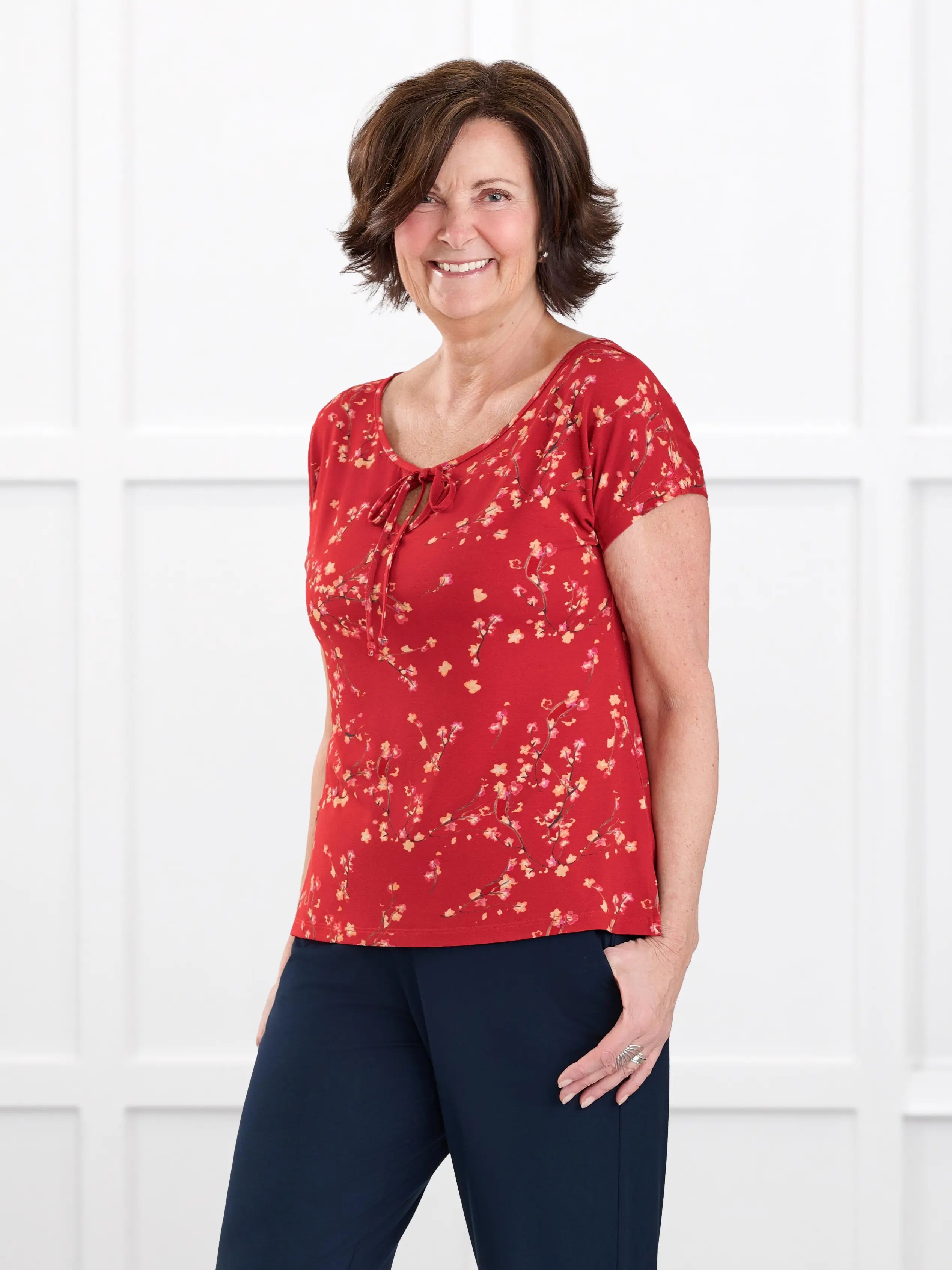 Josette reversible neckline keyhole dolman top for women in Chili blossom on model Donna, size S Regular @Donna-S-regular 