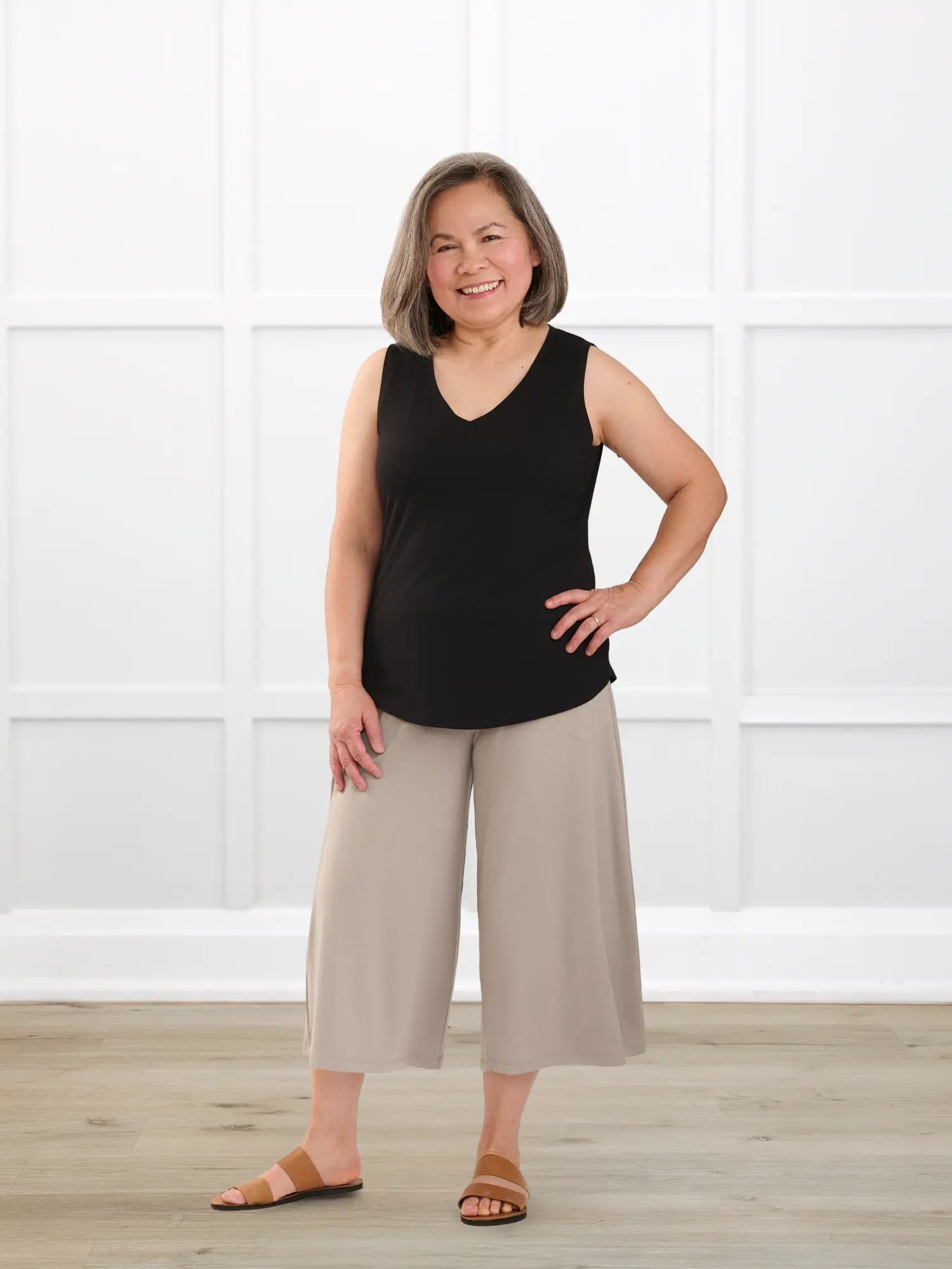 Jules v neck sleeveless top for women in Black on model Terry, size S @Terry-S 