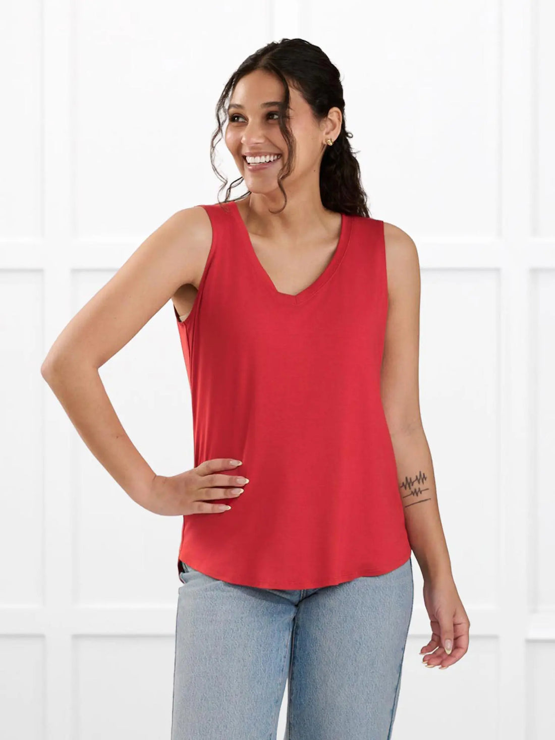 Jules v neck sleeveless top for women in Chili on model Meron, size XS @Meron-XS 