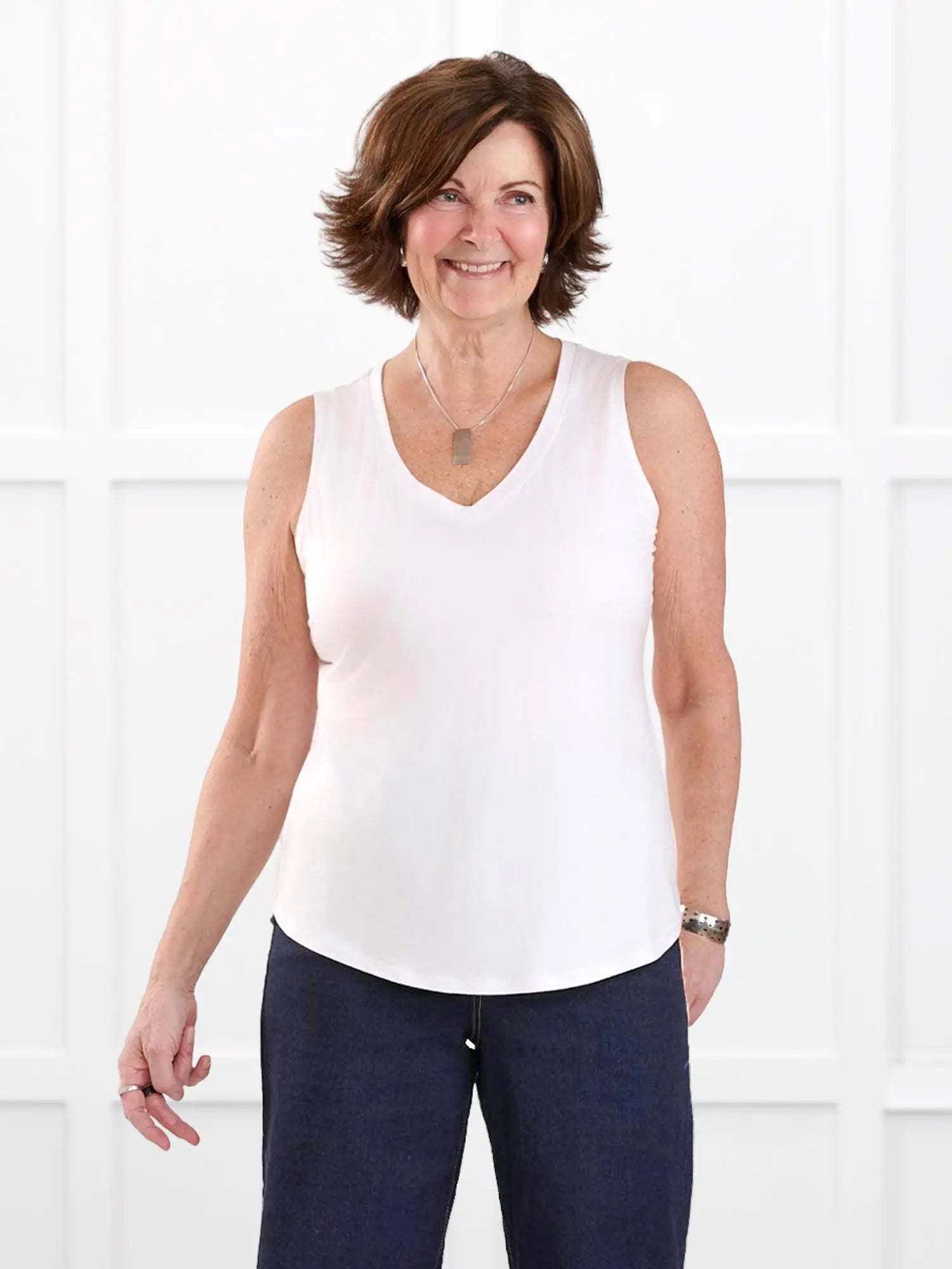 Jules v neck sleeveless top for women in White fabric irregular on model Donna, size S @Donna-S 