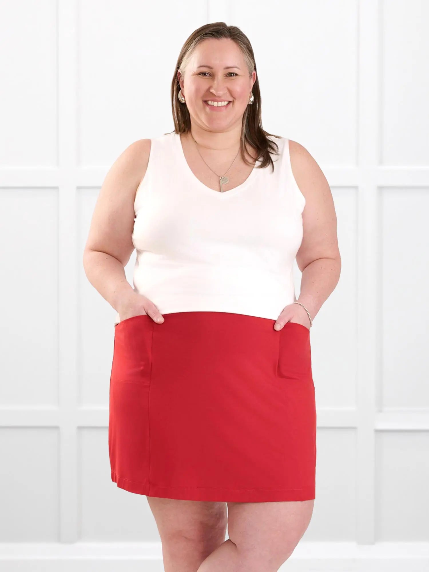 Jules v neck sleeveless top for women in White on model Cristina, size XXL @Cristina-XXL 