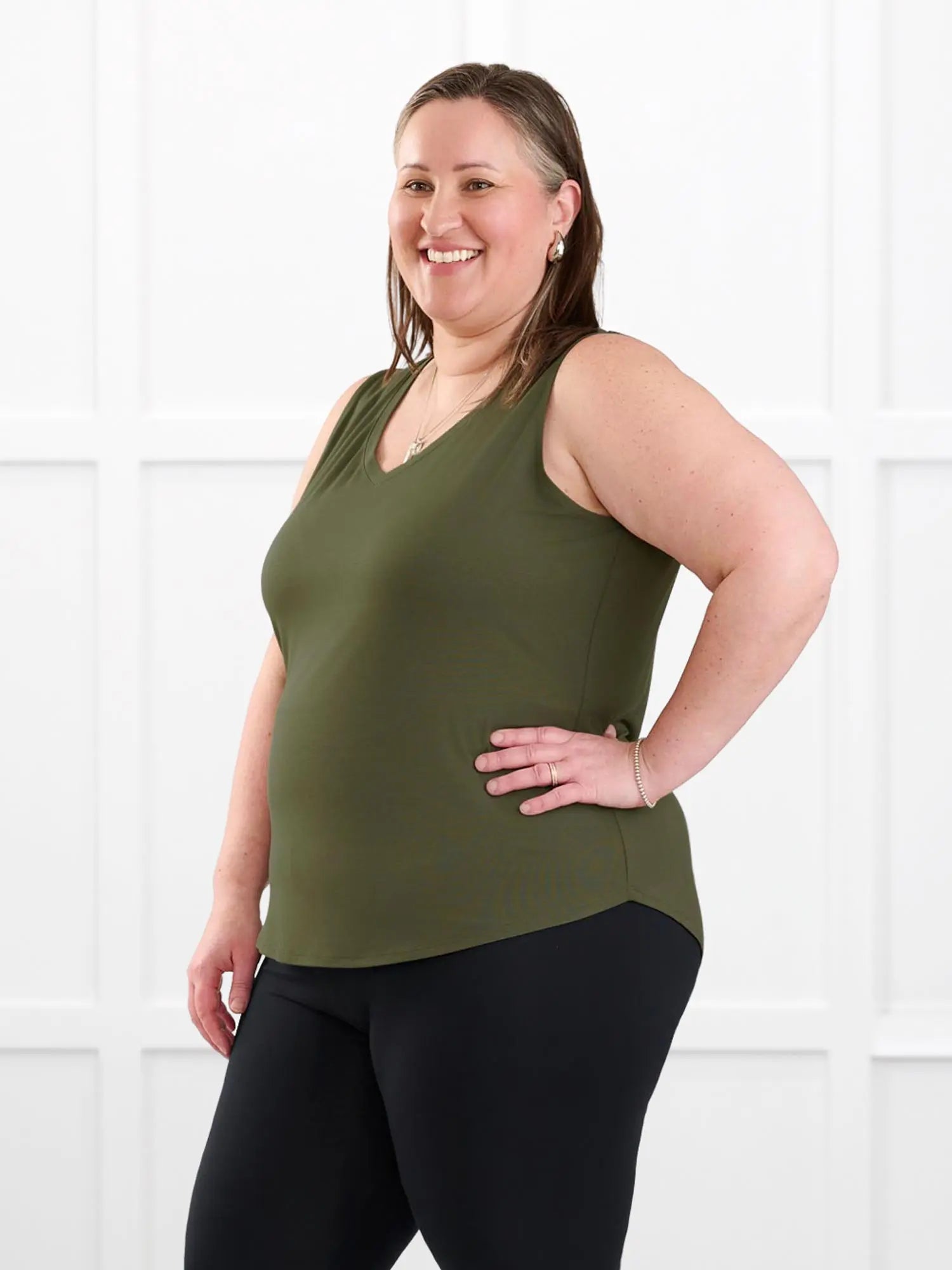 Jules v neck sleeveless top for women in Cactus green on model Cristina, size XXL @Cristina-XXL 