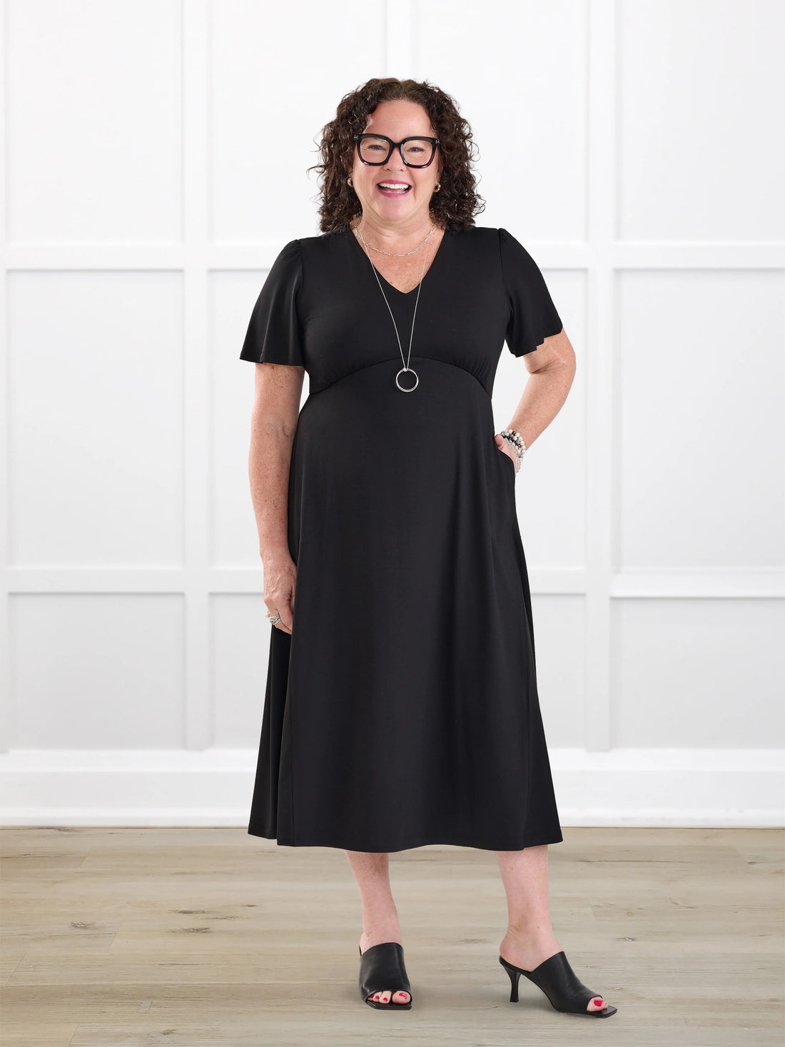 Juliana flutter sleeve midi dress for women in Black on model Kerri, size M Petite @Kerri-M-petite 