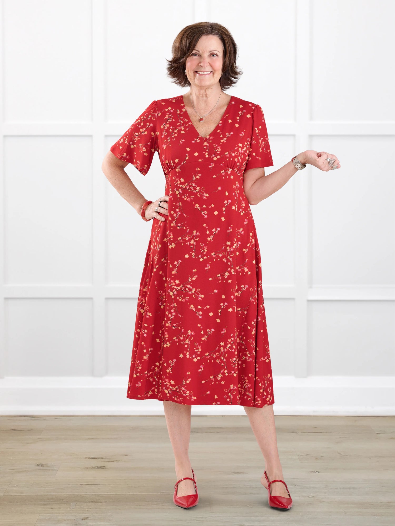 Juliana flutter sleeve midi dress for women in Chili blossom on model Donna, size S Regular @Donna-S-regular 