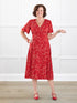 Juliana flutter sleeve midi dress for women in Chili blossom on model Donna, size S Regular @Donna-S-regular 
