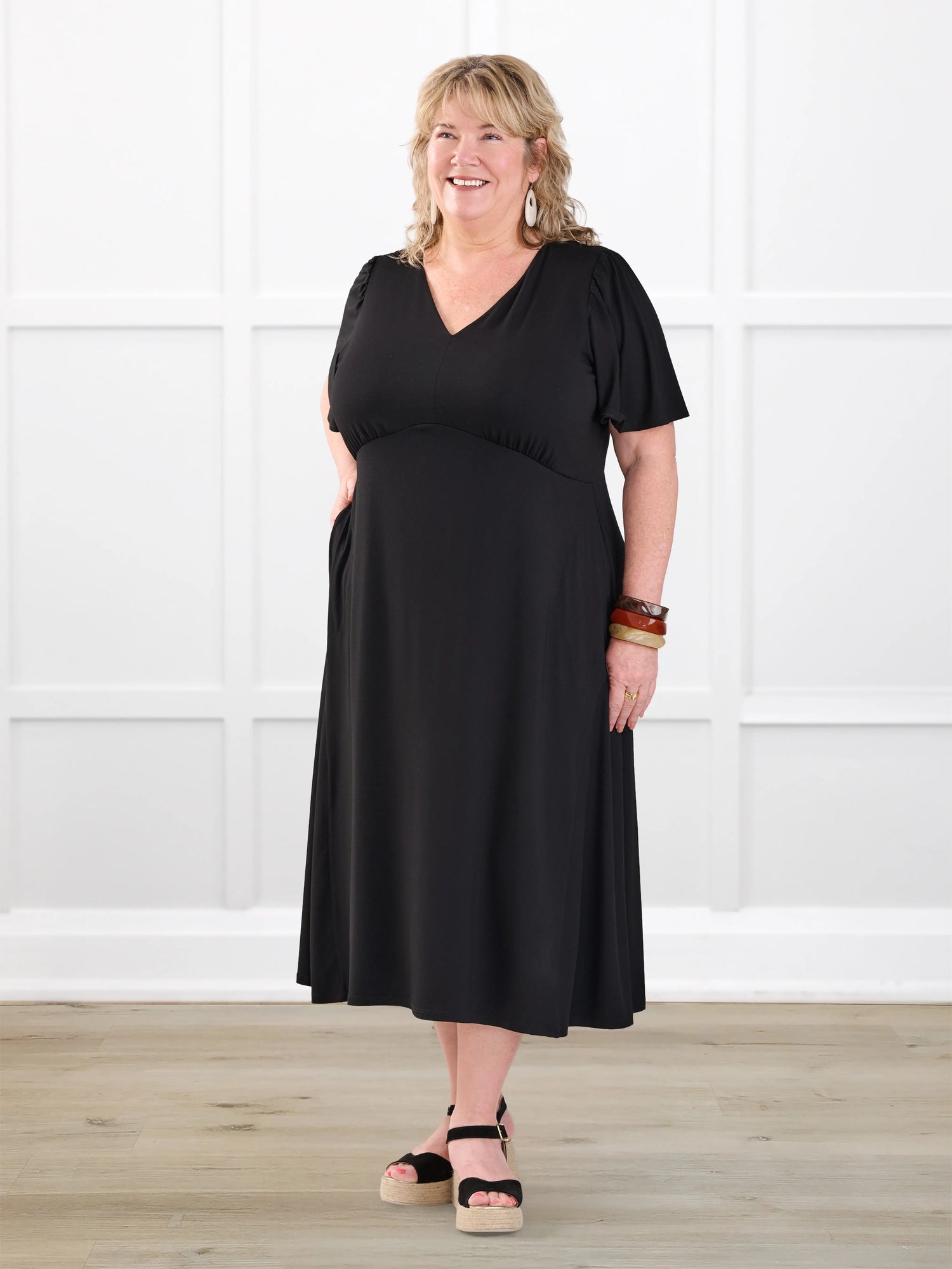 Juliana flutter sleeve midi dress for women in Black on model Kelly, size 3X @Kelly-3x 