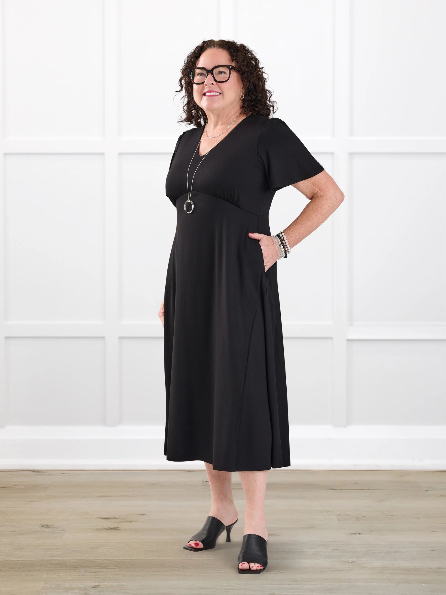 Juliana flutter sleeve midi dress for women in Black on model Kerri, size M Petite @Kerri-M-petite 