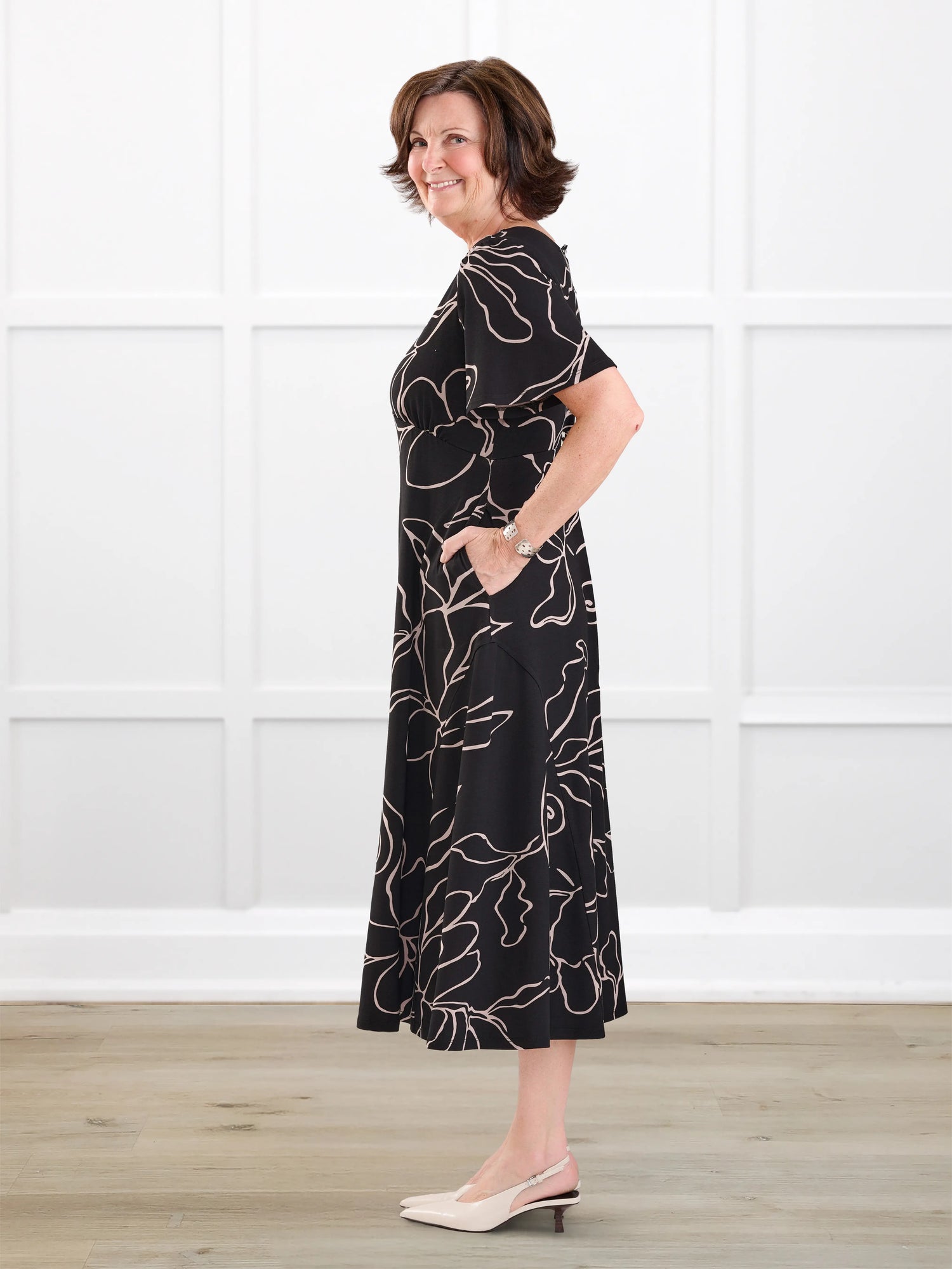 Juliana flutter sleeve midi dress for women in Contour floral on model Donna, size S Regular @Donna-S-regular 
