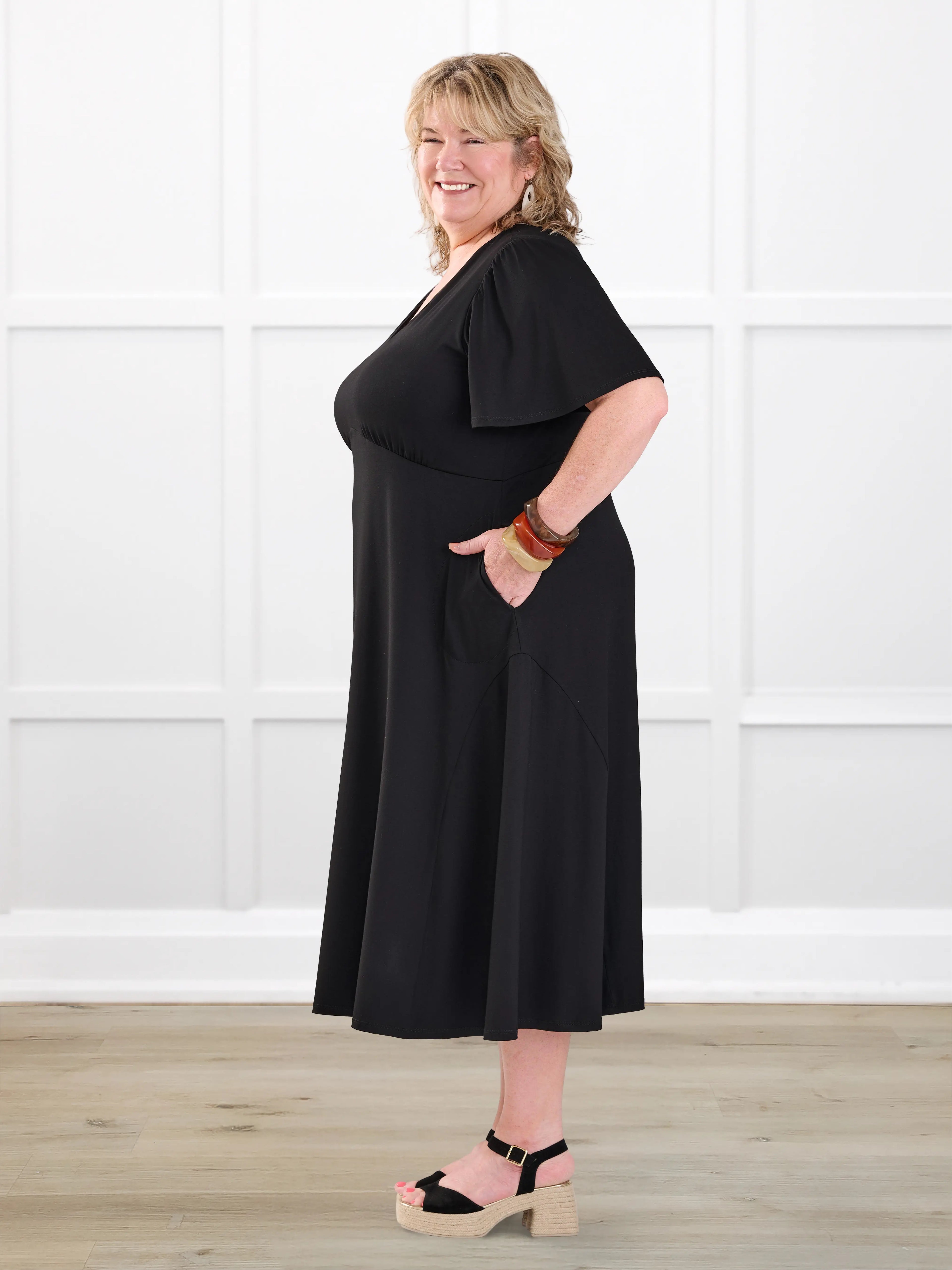 Juliana flutter sleeve midi dress for women in Black on model Kelly, size 3X @Kelly-3x 