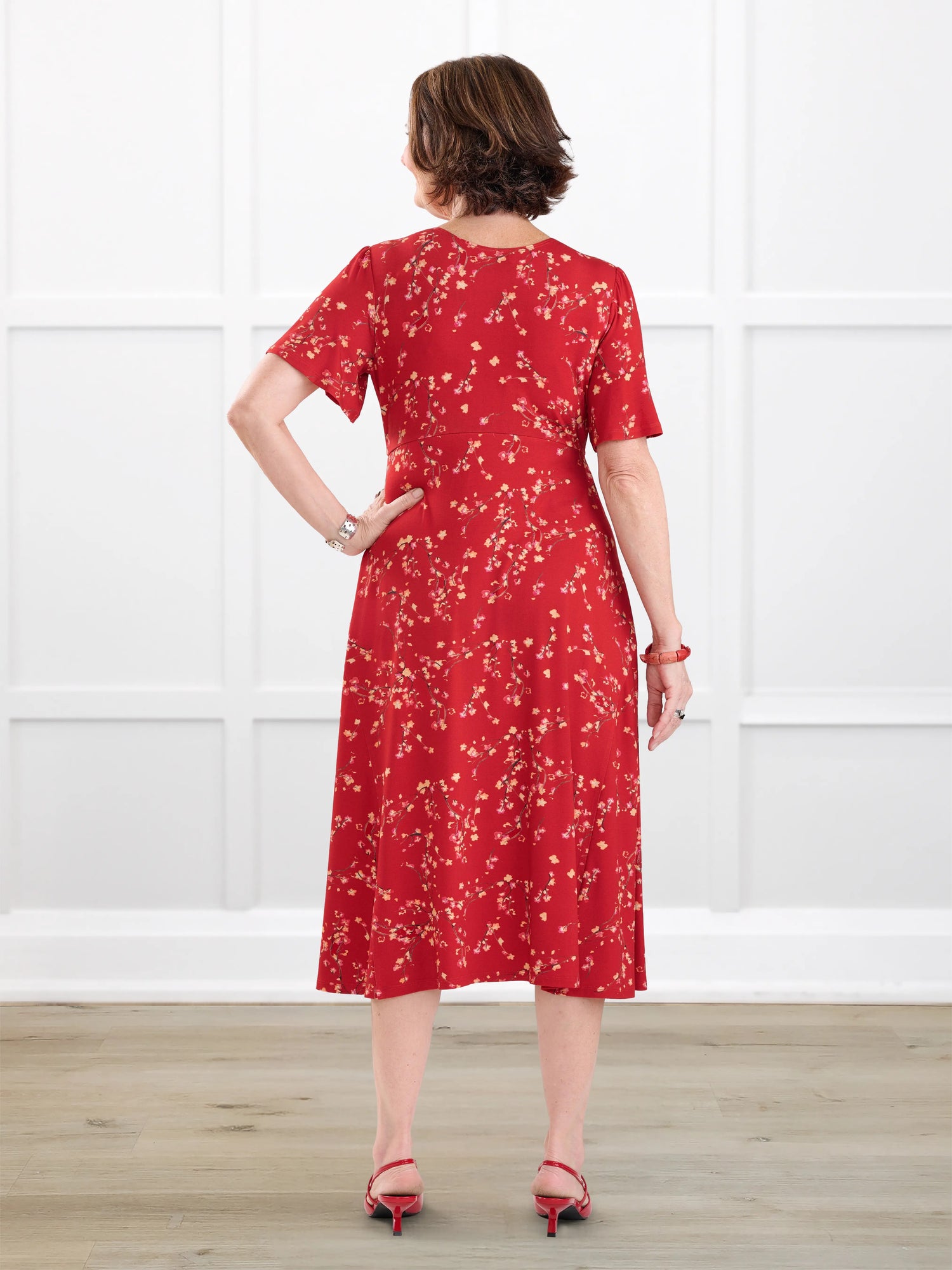 Juliana flutter sleeve midi dress for women in Chili blossom on model Donna, size S Regular @Donna-S-regular 