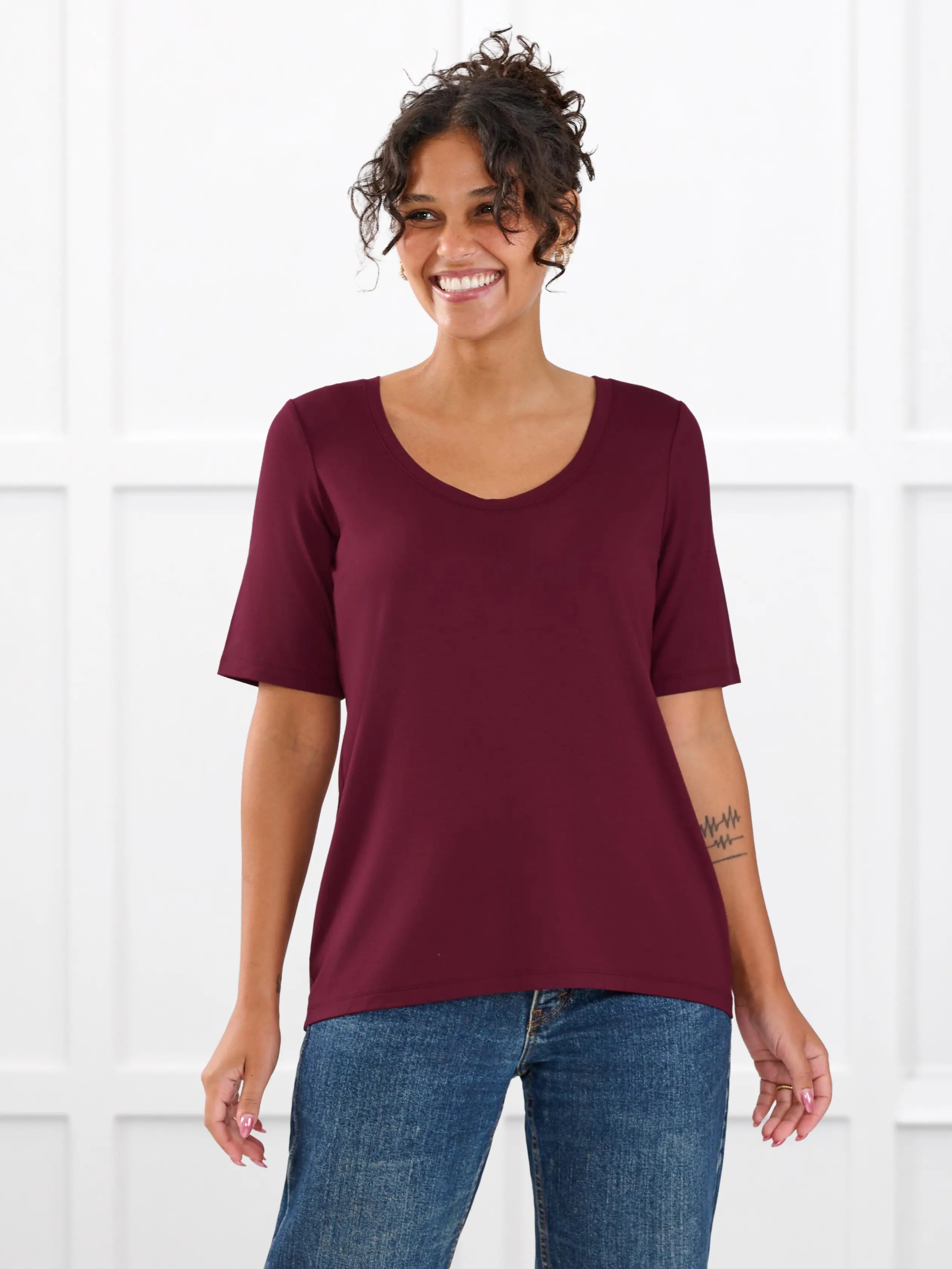 Julita scoop neck half sleeve tee for women in Merlot on model Meron, size XS @Meron-XS 