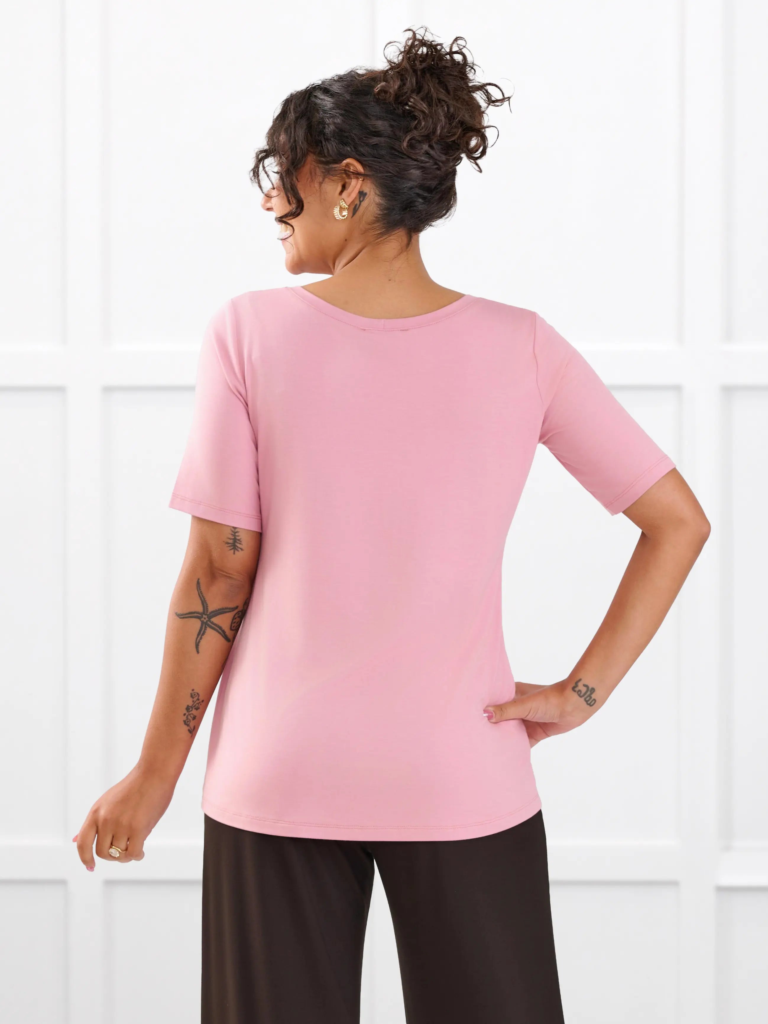 Julita scoop neck half sleeve tee for women in Rosebud on model Meron, size XS @Meron-XS 