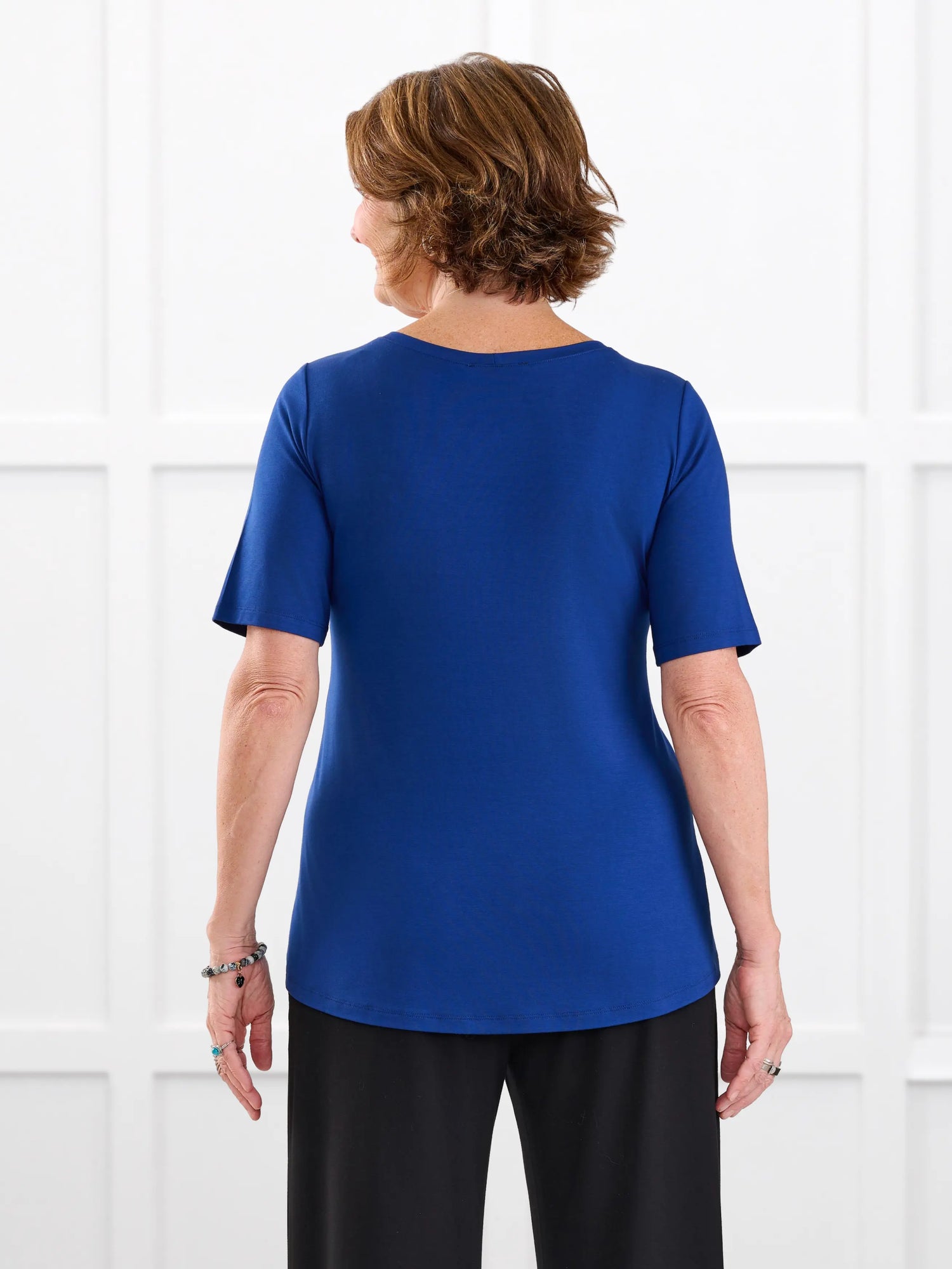 Julita scoop neck half sleeve tee for women in Ink blue on model Donna, size S @Donna-S 