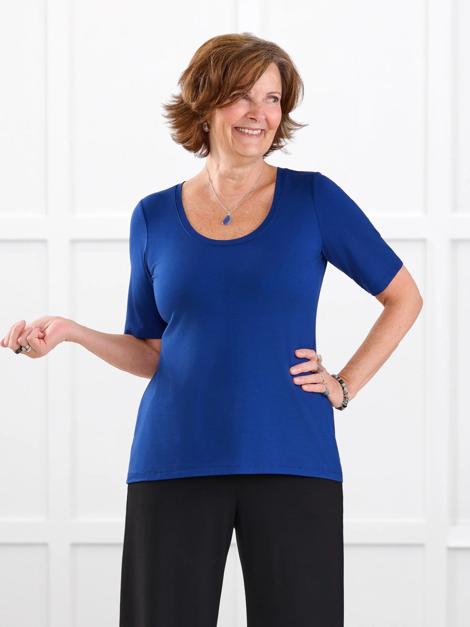 Julita scoop neck half sleeve tee for women in Ink blue on model Donna, size S @Donna-S 