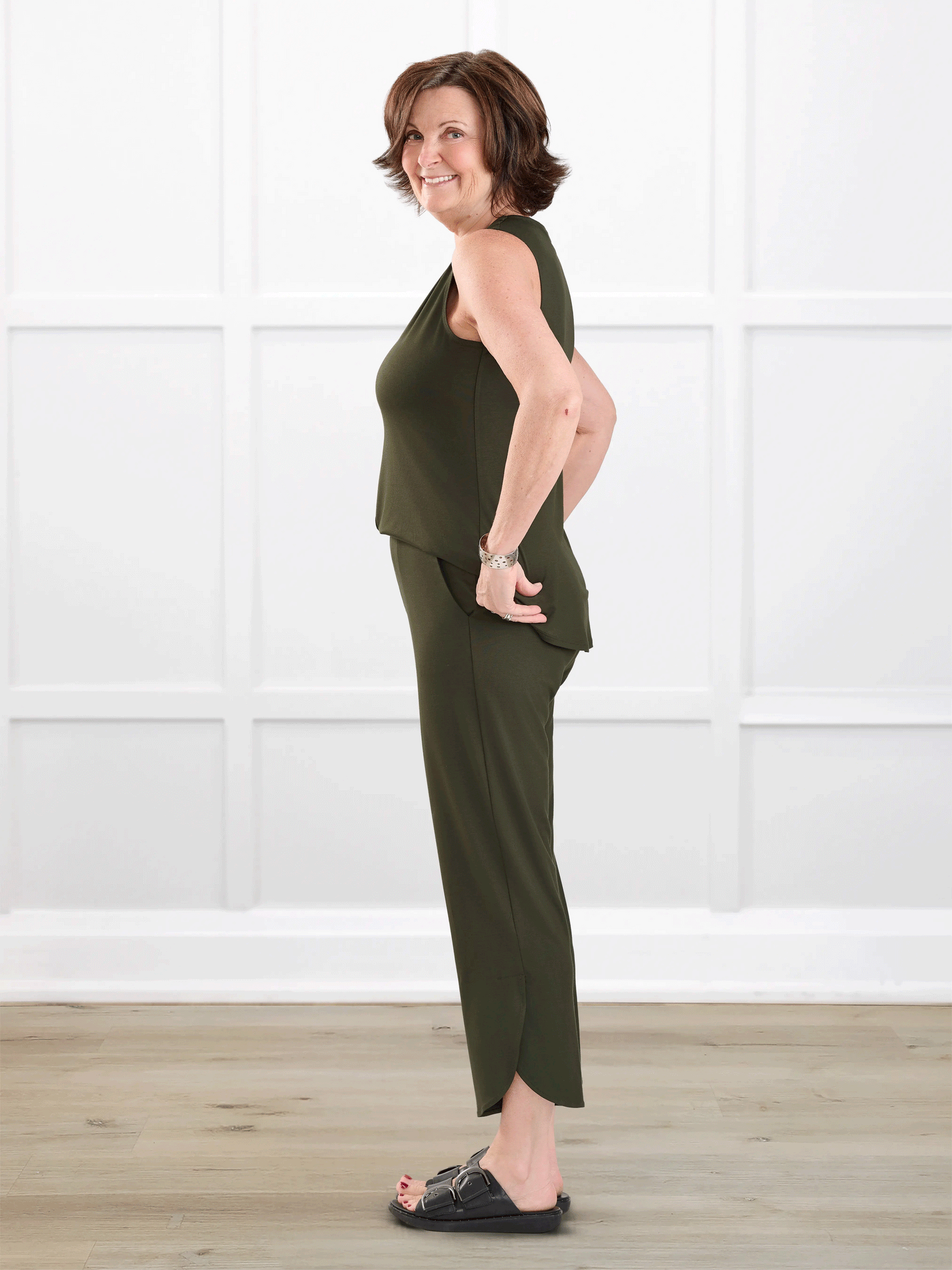 Juna open back dressy capri jumpsuit for women in Olive on model Donna, size S @Donna-S 