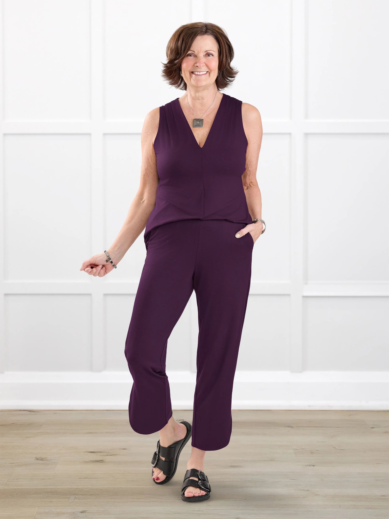 Juna open back dressy capri jumpsuit for women in Port on model Donna, size S @Donna-S 