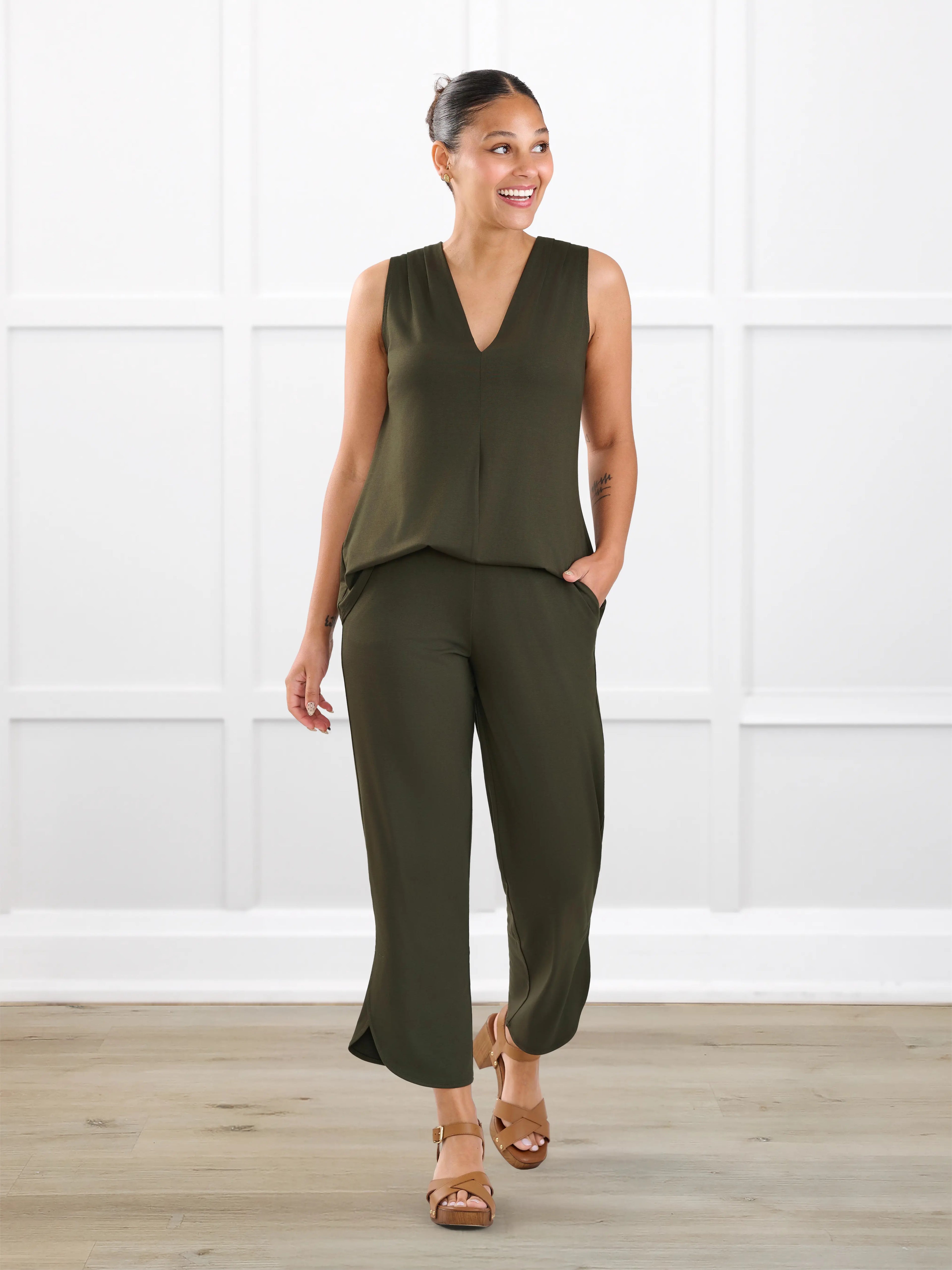 Juna open back dressy capri jumpsuit for women in Olive on model Meron, size XS @Meron-XS 