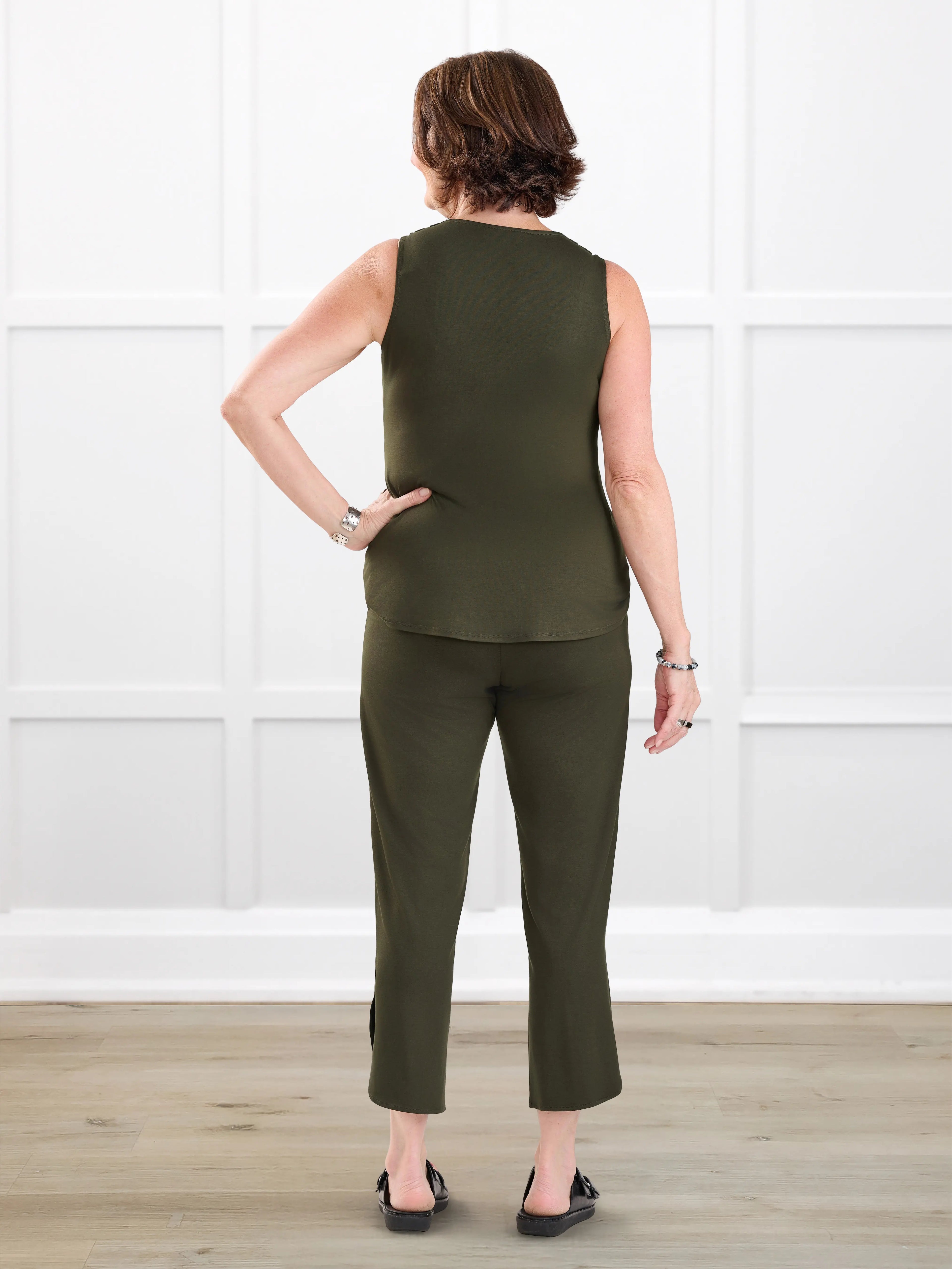 Juna open back dressy capri jumpsuit for women in Olive on model Donna, size S @Donna-S 