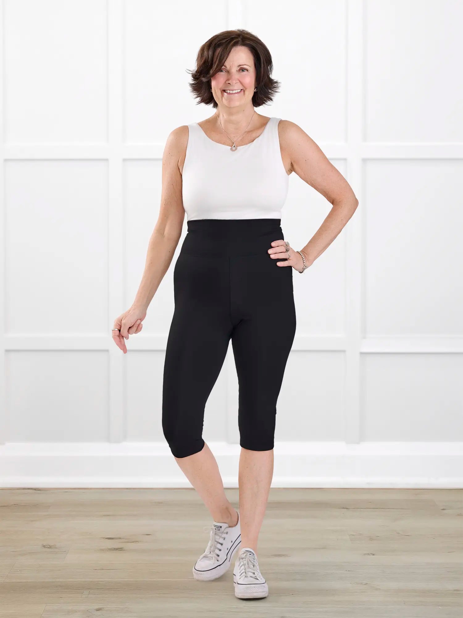 Kaede high waisted knee length legging for women in Black on model Donna, size S @Donna-S 