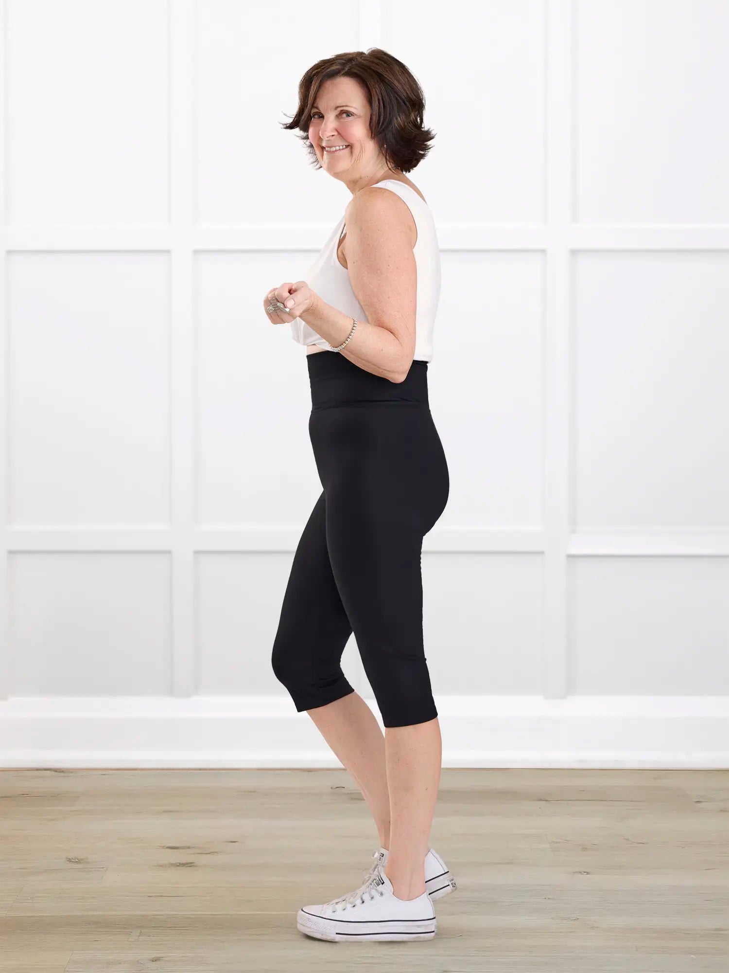 Kaede high waisted knee length legging for women in Black on model Donna, size S @Donna-S 