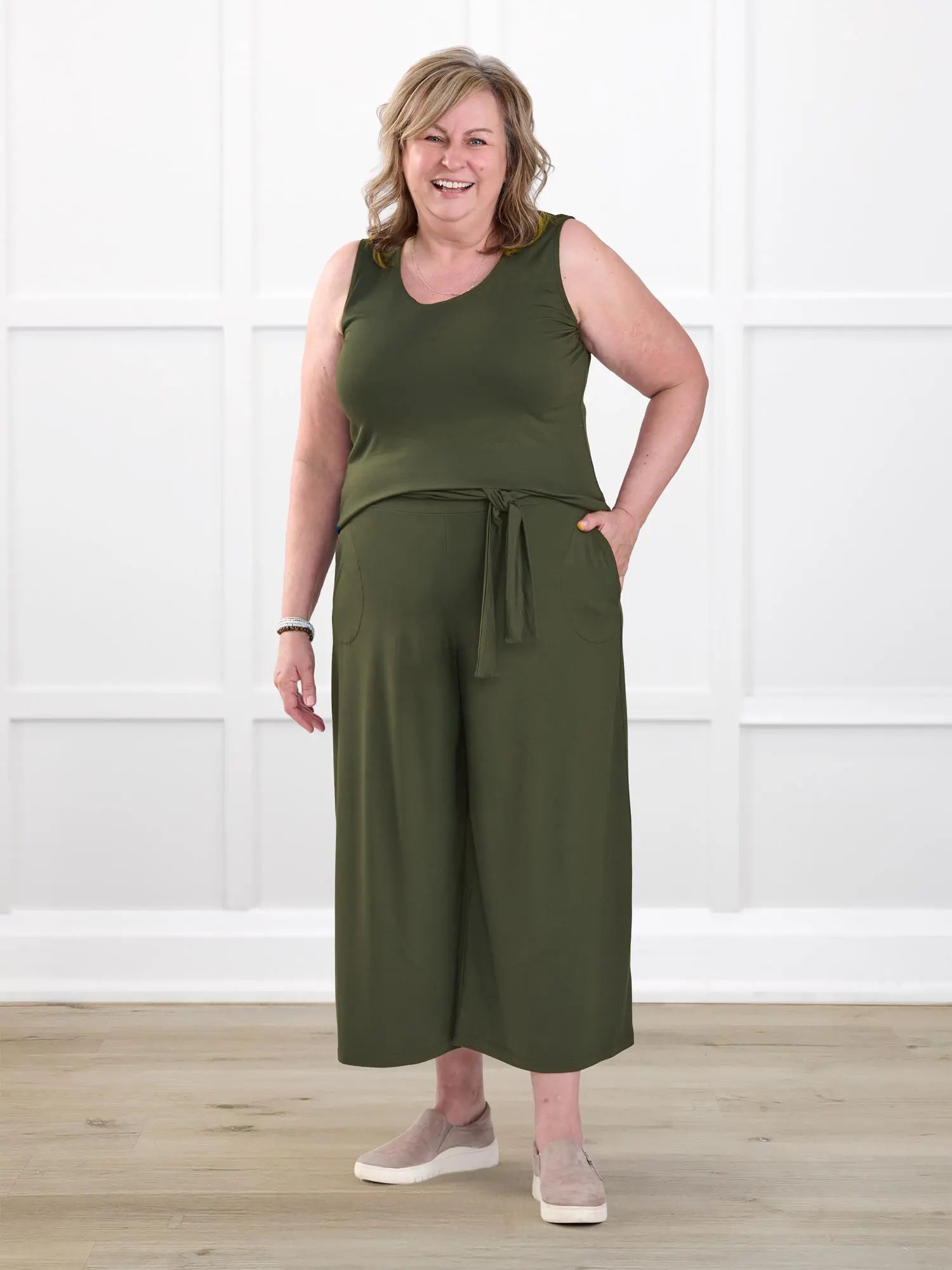 Kavita open back capri jumpsuit for women in Cactus green on model Deb, size XL @Deb-XL 