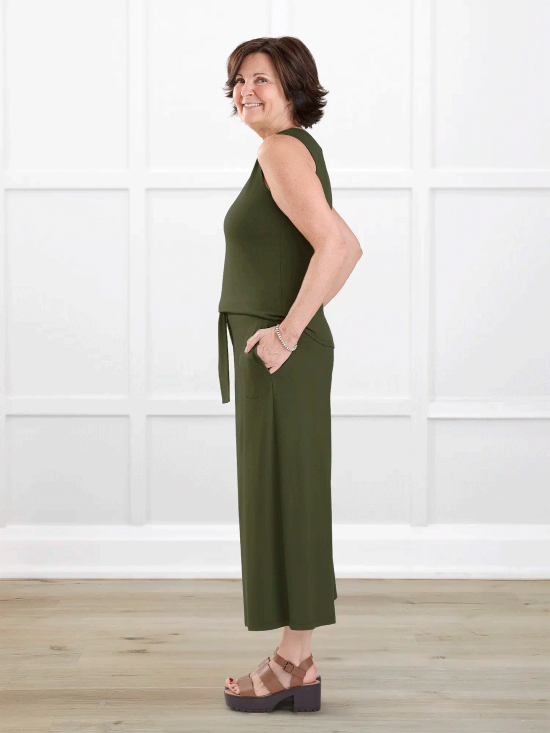 Kavita open back capri jumpsuit for women in Cactus green on model Donna, size S @Donna-S 
