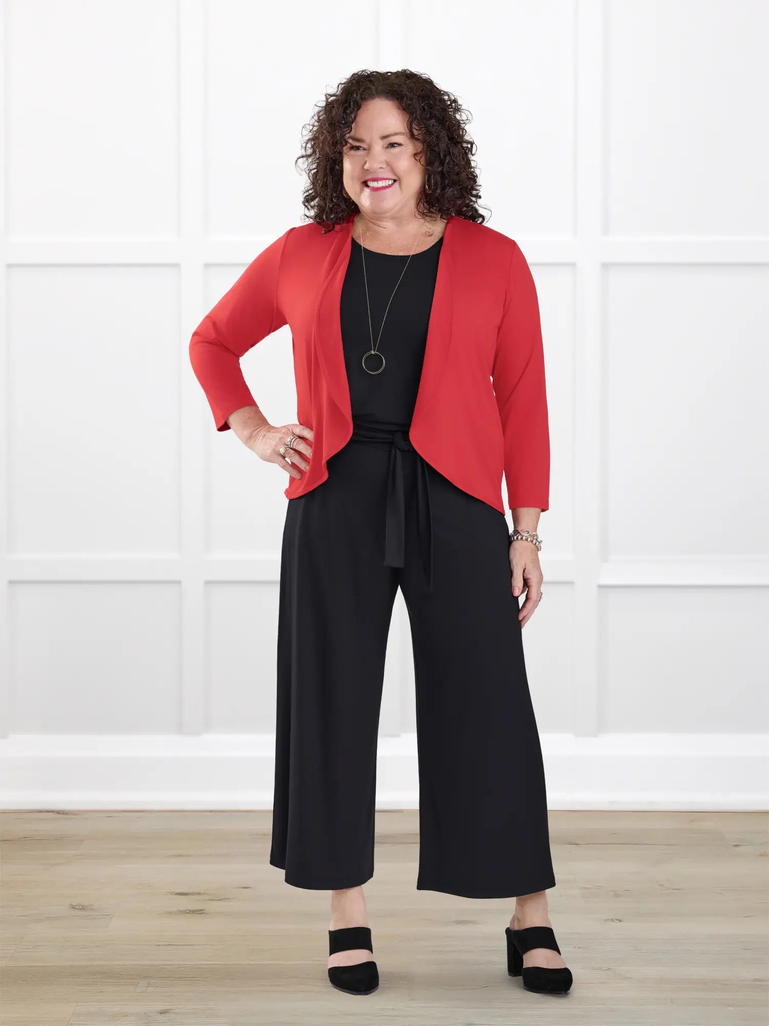 Kavita open back capri jumpsuit for women in Black on model Kerri, size M @Kerri-M-petite 