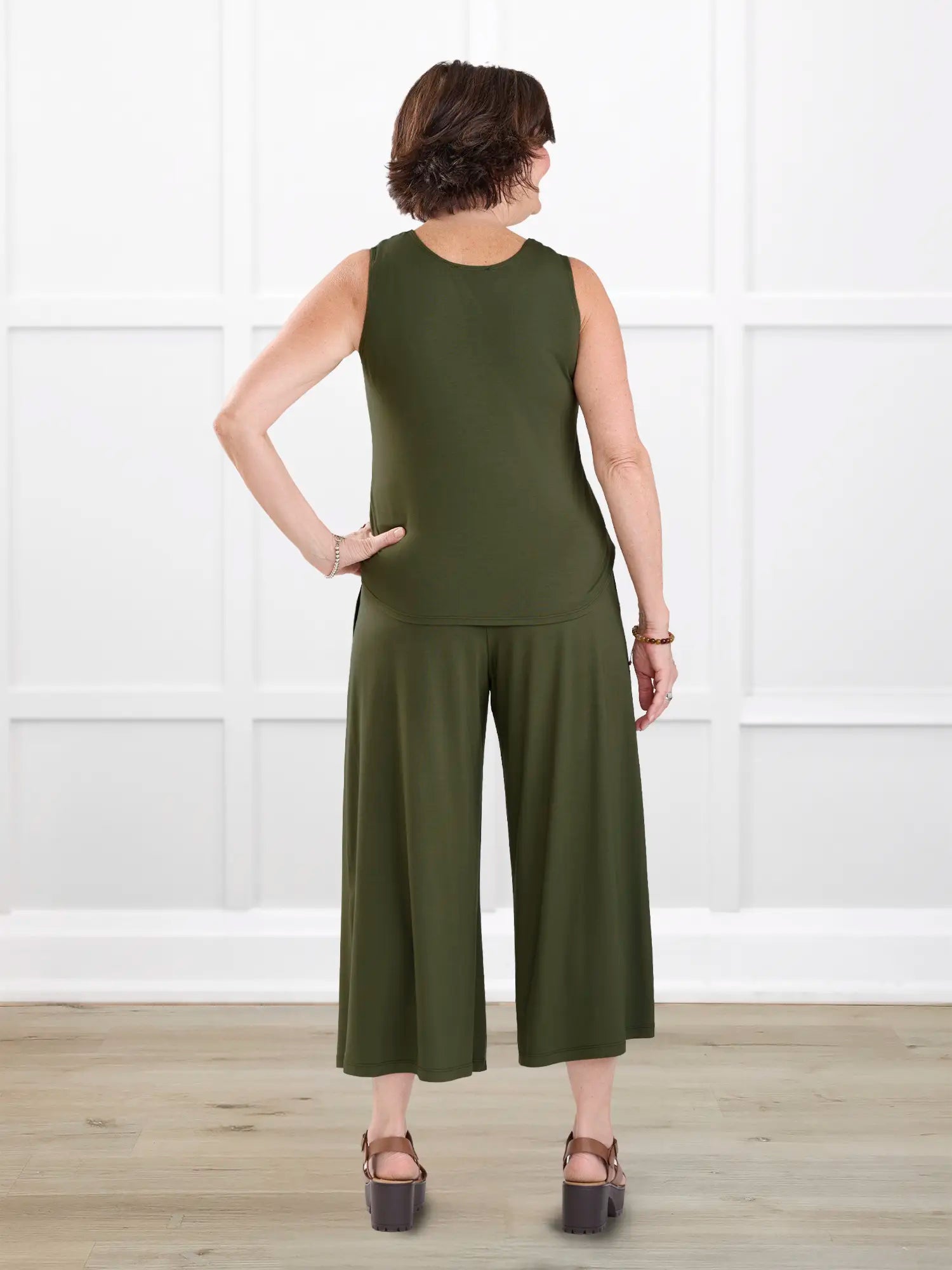 Kavita open back capri jumpsuit for women in Cactus green on model Donna, size S @Donna-S 
