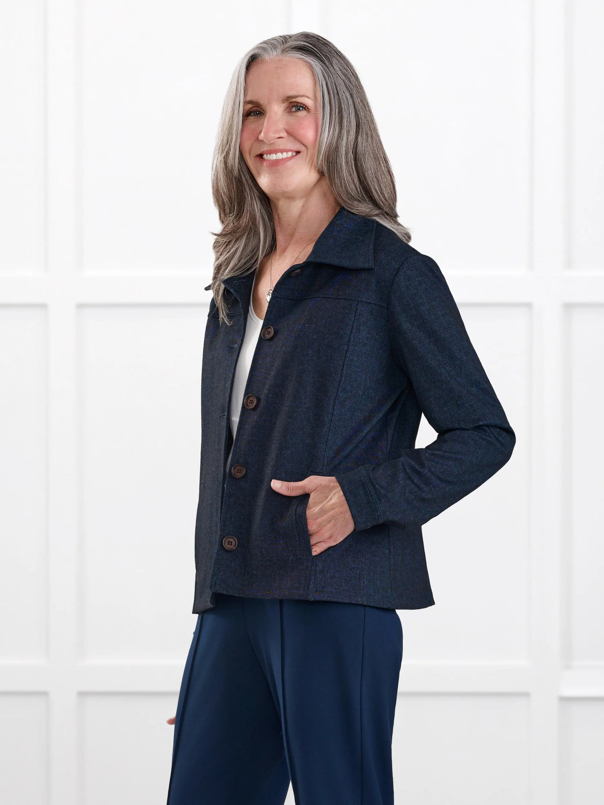 Kenzie faux denim stretch jean jacket for women in Indigo blue on model Jen, size XS @Jen-XS 
