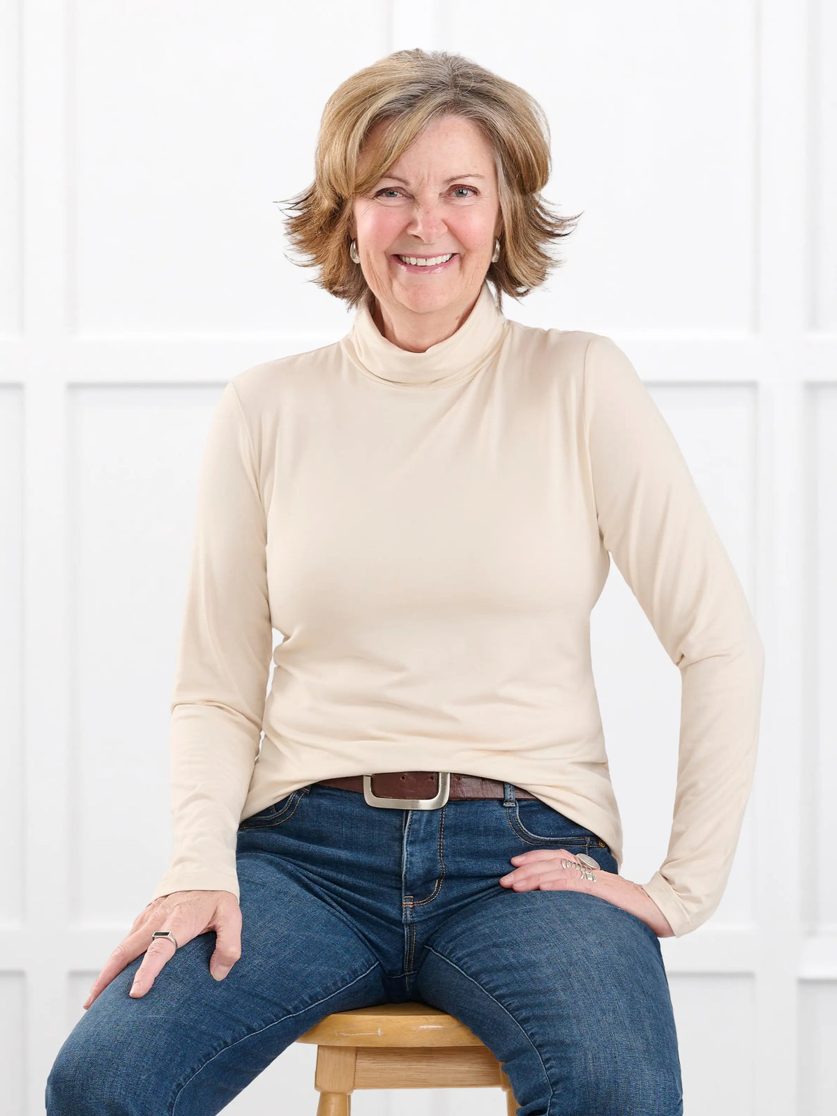 Kerry turtleneck top for women in Shortbread on model Donna, size S @Donna-S 