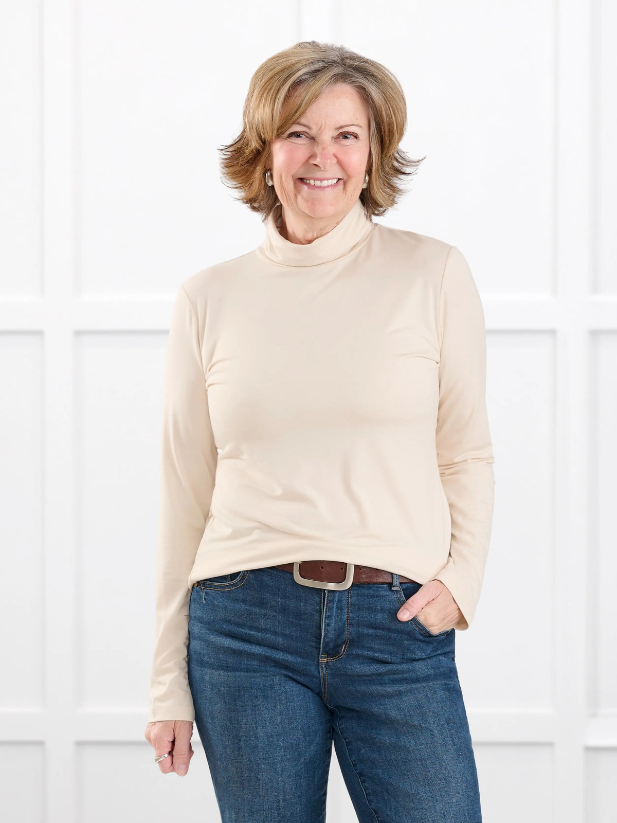 Kerry turtleneck top for women in Shortbread on model Donna, size S @Donna-S 