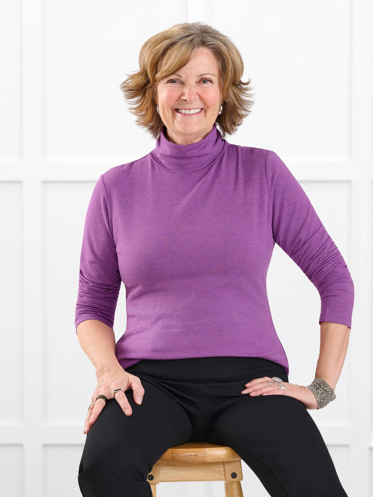 Kerry turtleneck top for women in Lupin melange on model Donna, size S @Donna-S 