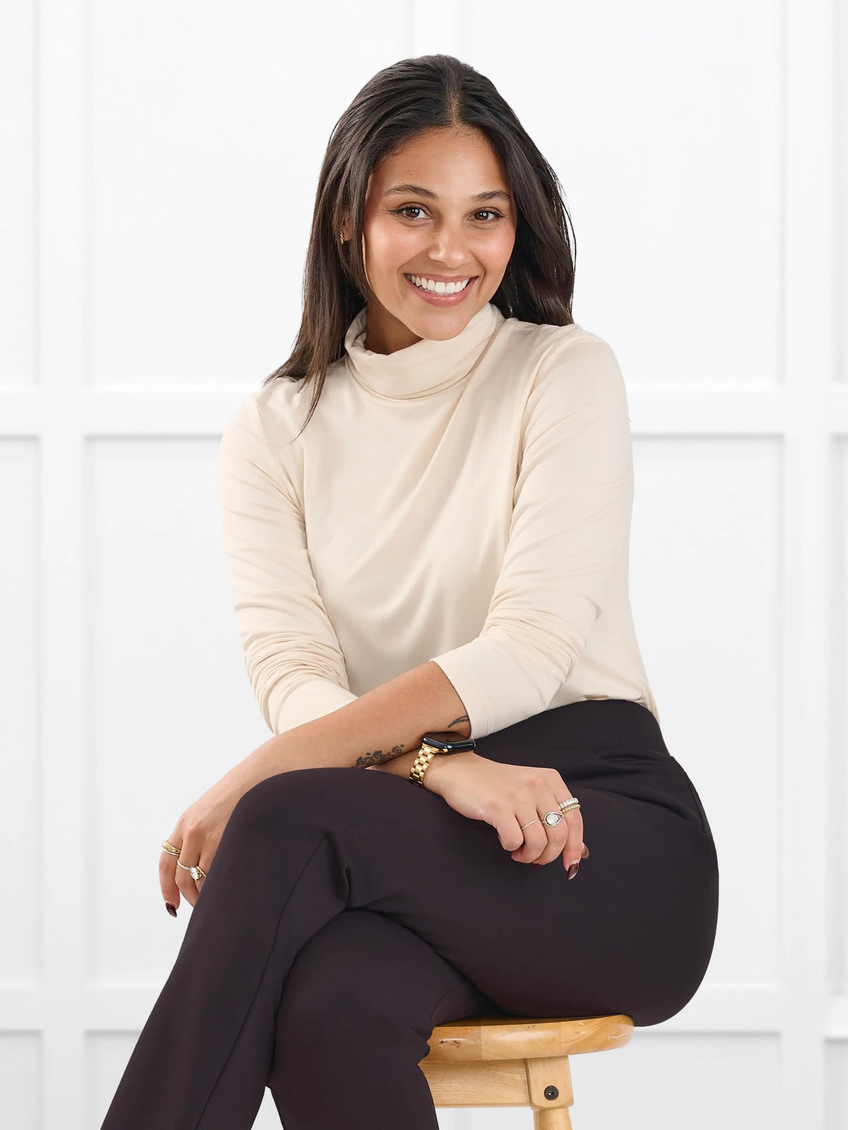 Kerry turtleneck top for women in Shortbread on model Meron, size XS @Meron-XS 