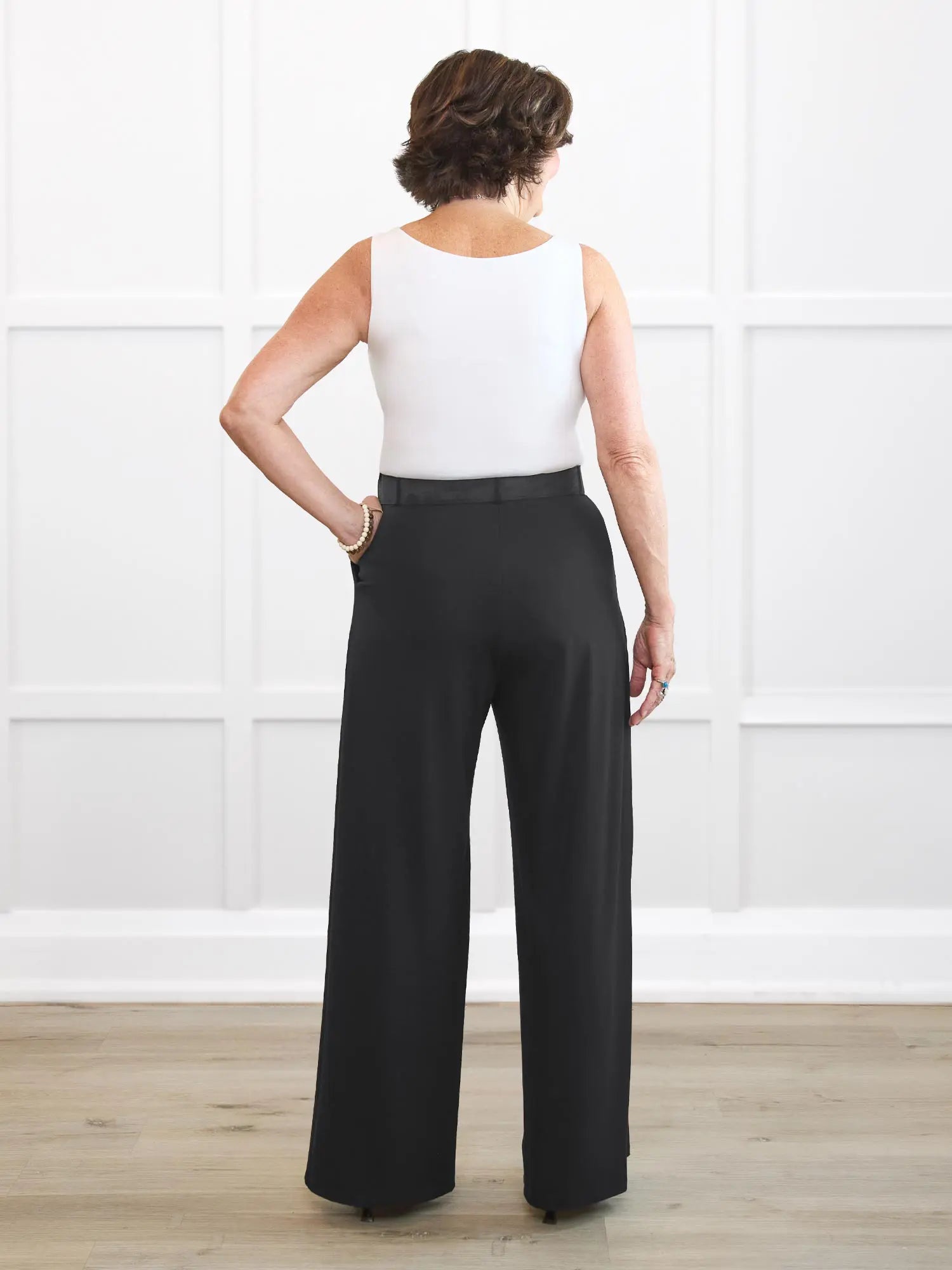 Kiya high waisted wide leg pleated pant for women in Black on model Donna, size S Regular @Donna-S-regular 