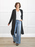 Larissa duster cardigan with pockets for women in Black on model Donna, size S Regular @Donna-S-regular 