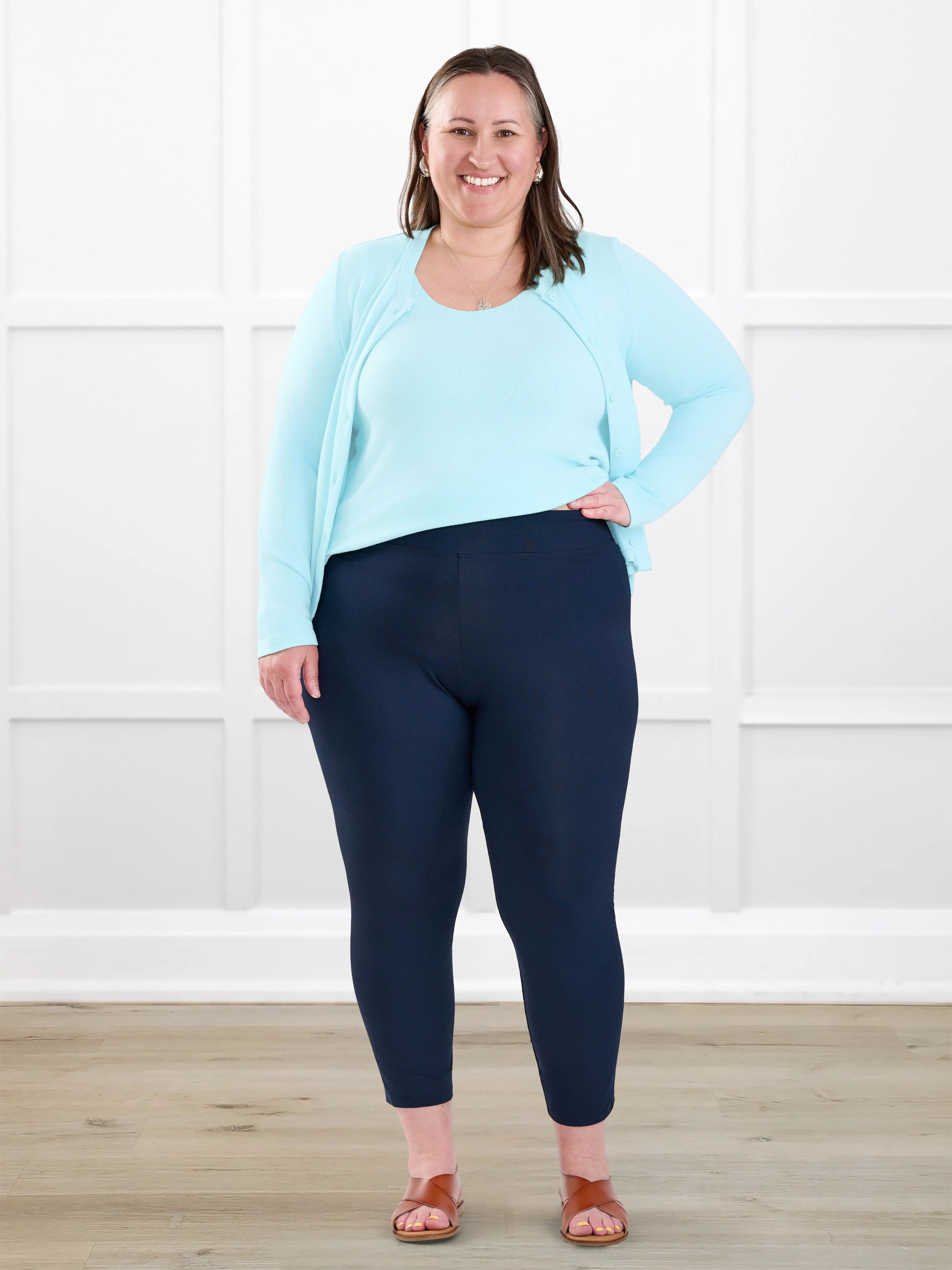 Lucy mid rise capri legging for women in Navy on model Cristina, size XXL @Cristina-XXL 