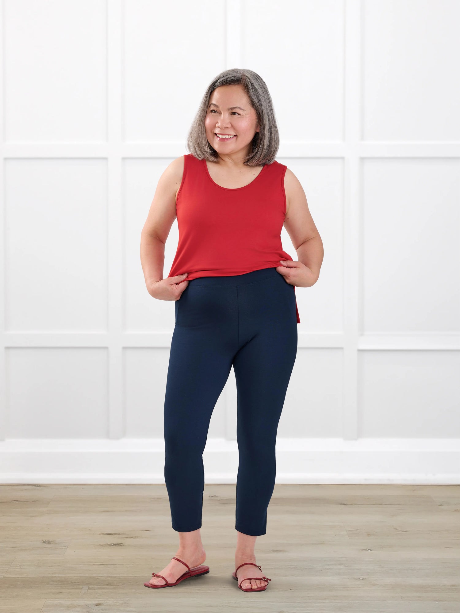 Lucy mid rise capri legging for women in Navy on model Terry, size S @Terry-S 