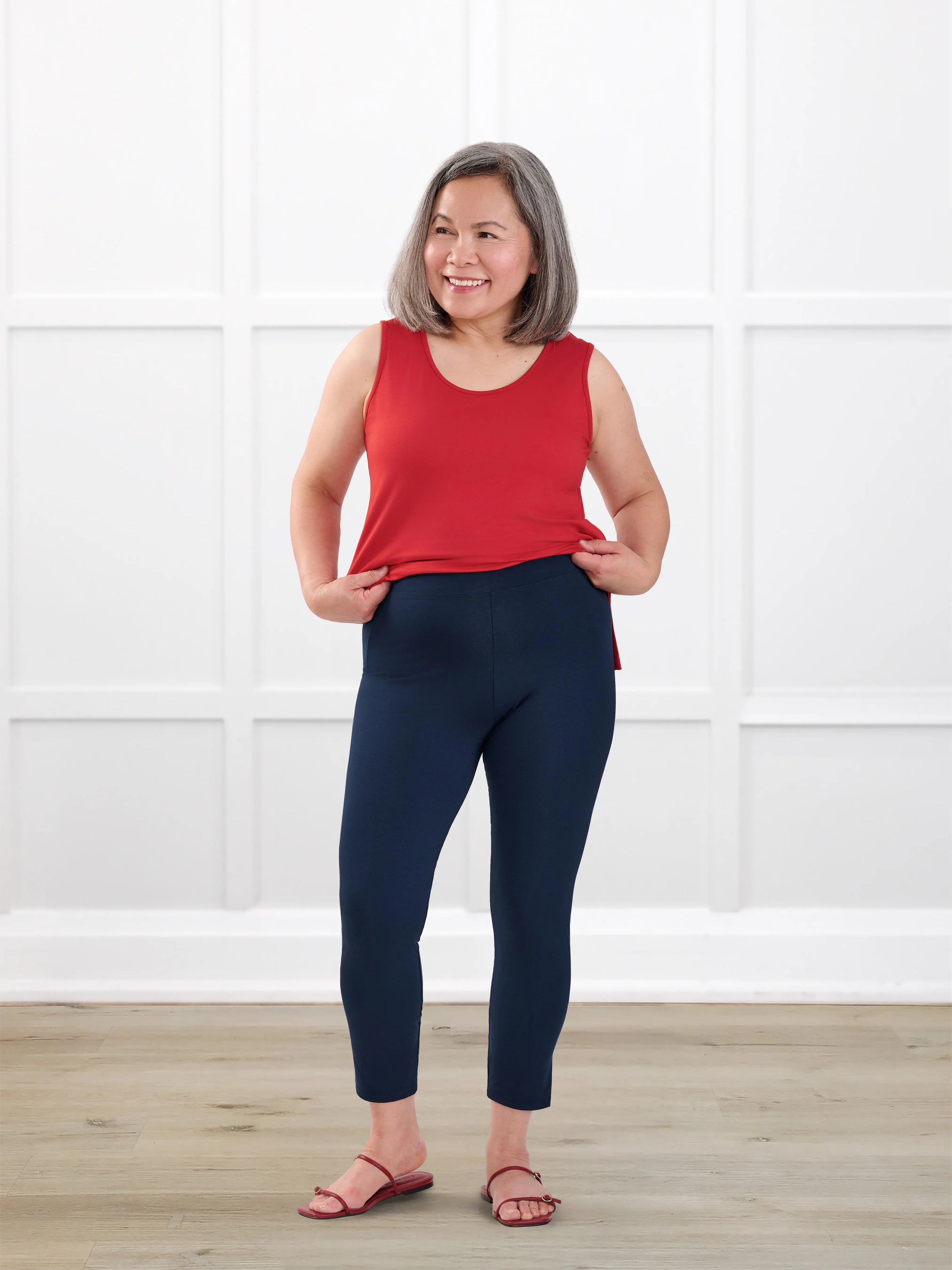 Lucy mid rise capri legging for women in Navy on model Terry, size S @Terry-S 
